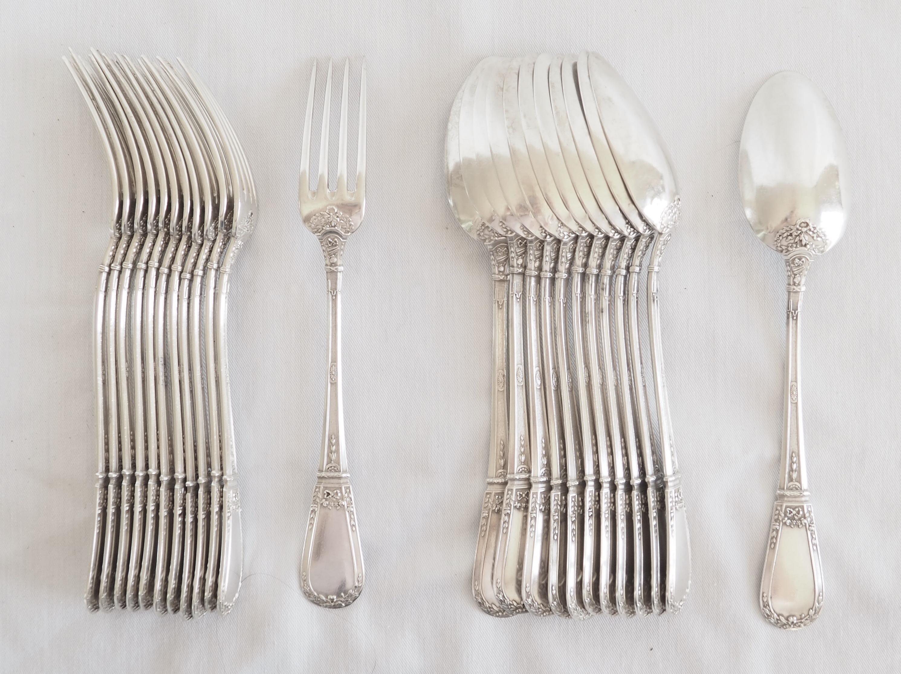 French antique sterling silver dessert flatware for 12 guests, 24 pieces composed of 12 dessert spoons and 12 dessert forks.

Very elegant late 19th century production, high-end quality set with perfect proportions, rich and much refined Louis XVI