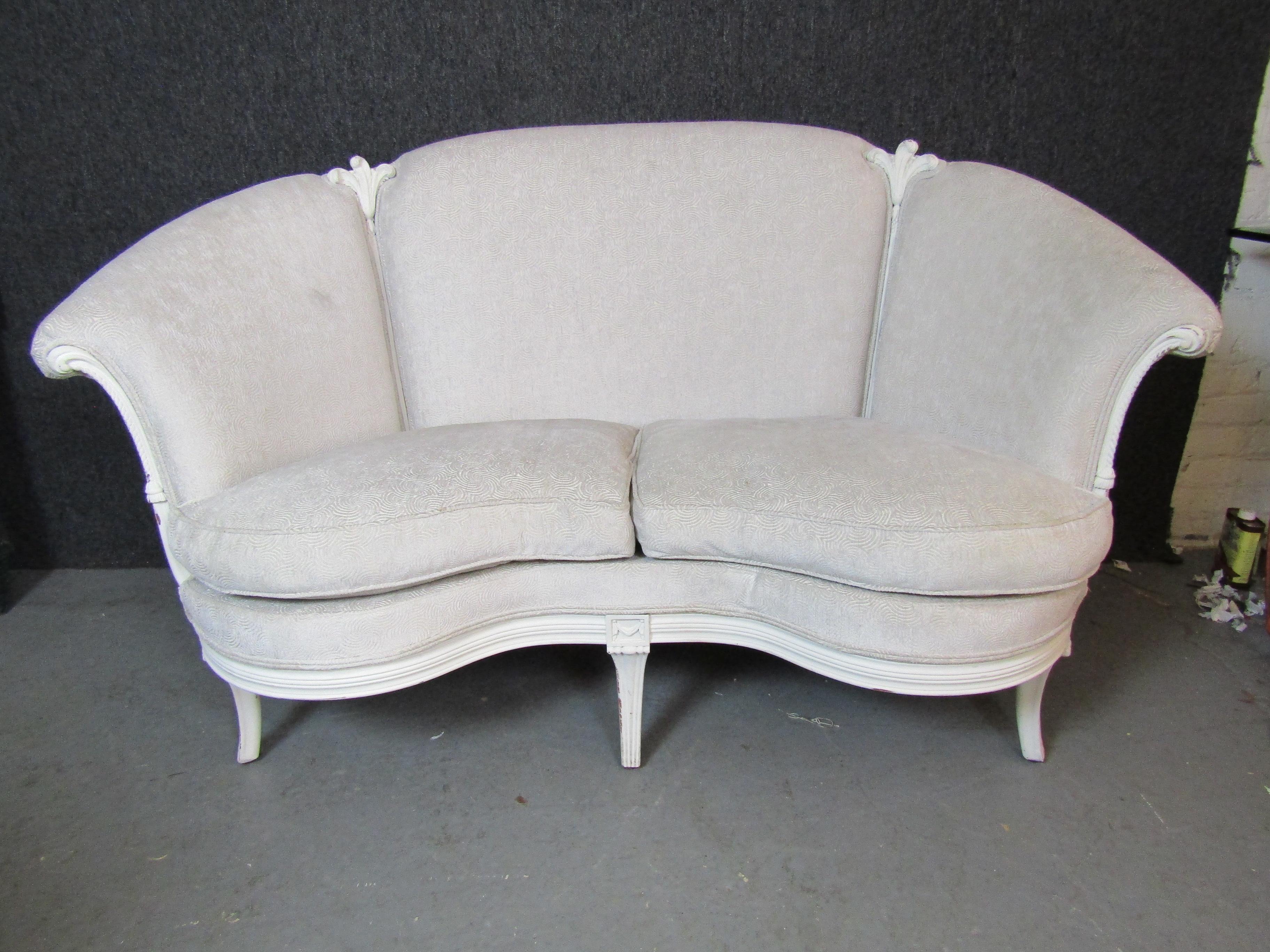 Antique revival loveseat with French inspired wood carved frame and soft cushions. Decorative detailing throughout the sculpted wood frame.
Please confirm location NY or NJ