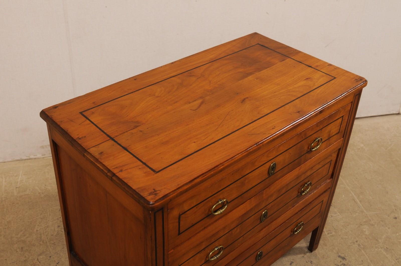 20th Century French Antique Three-Drawer Commode with Ebonized Inlay Accent Trim For Sale