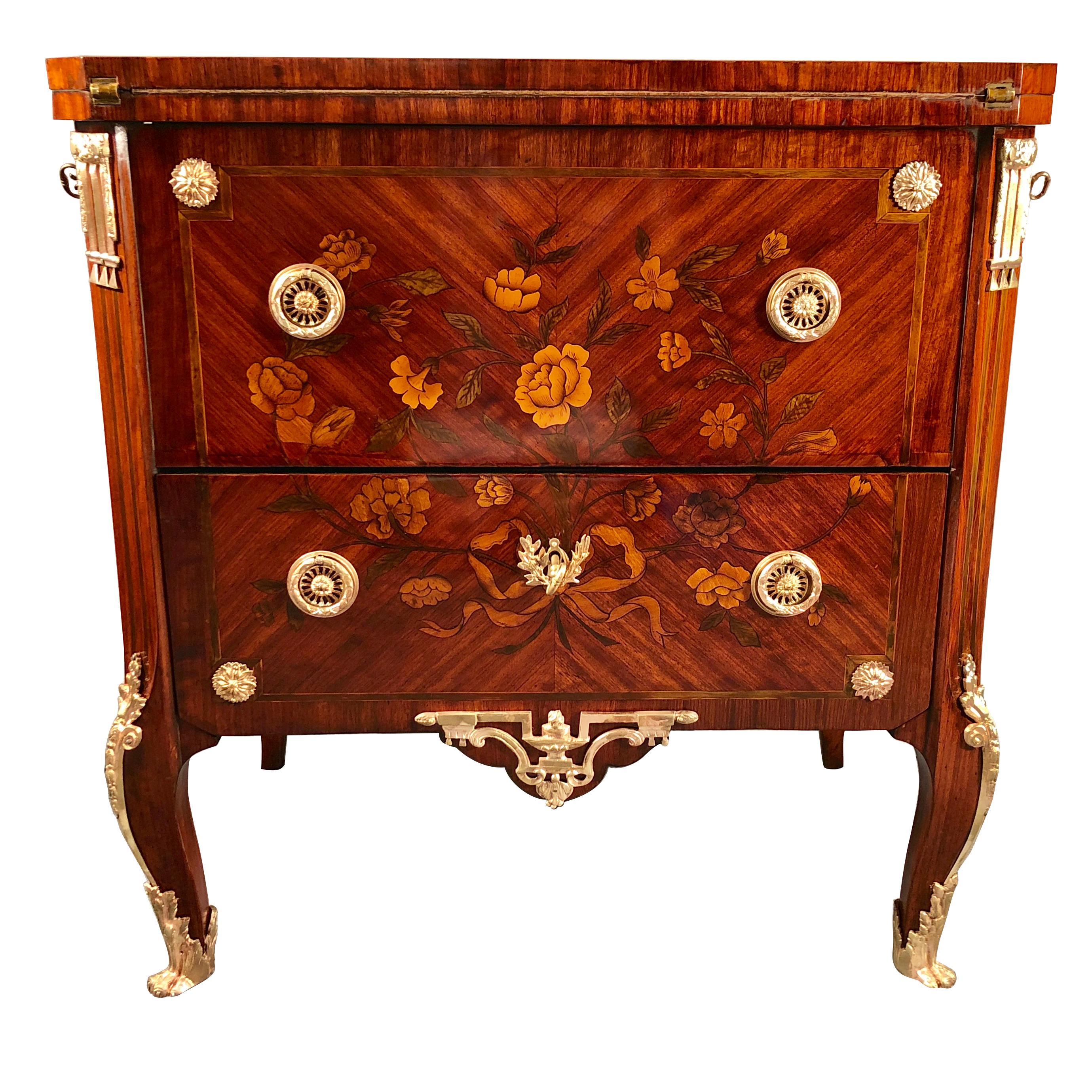 The French antique transformation furniture chest of drawers, originates from Paris and dates back to around 1800. The special feature of this unique and extraordinary piece is hidden underneath its top.  The top can be lifted up and reveals the top