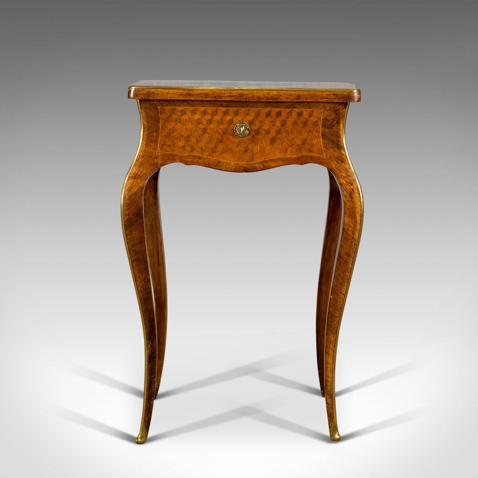 This is a French antique vanity table, a jewelry box table in kingwood dating to the late 19th century, circa 1880.

The kingwood displaying good color and grain interest
Finished in an appealing 'jeux de fond' cube marquetry
Attractive French