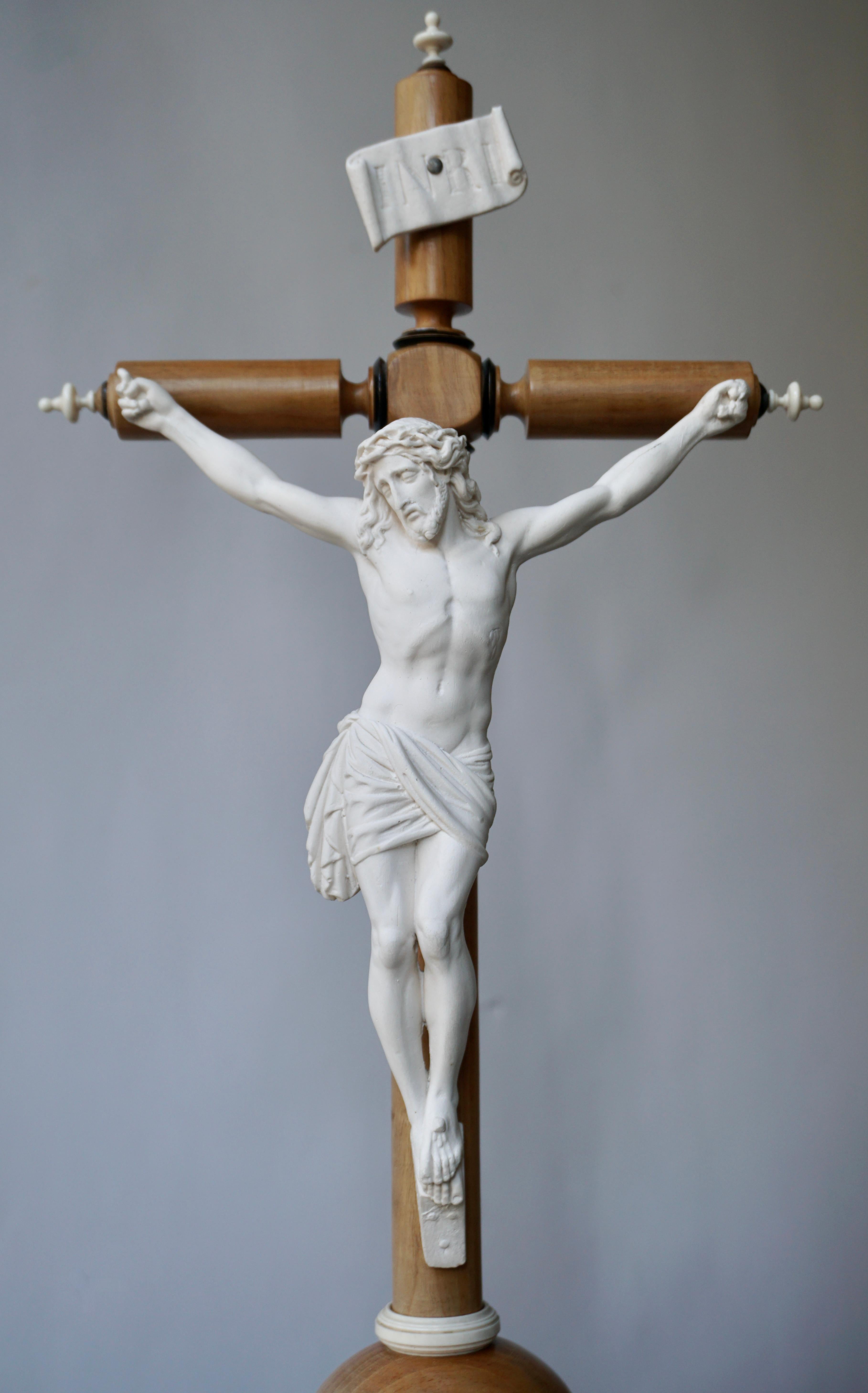 19th century French antique wood crucifix with a porcelain bisque figure of Christ.
Signed G M.