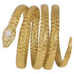 Antique French Bracciale a serpente flessibile intrecciato in oro e diamanti