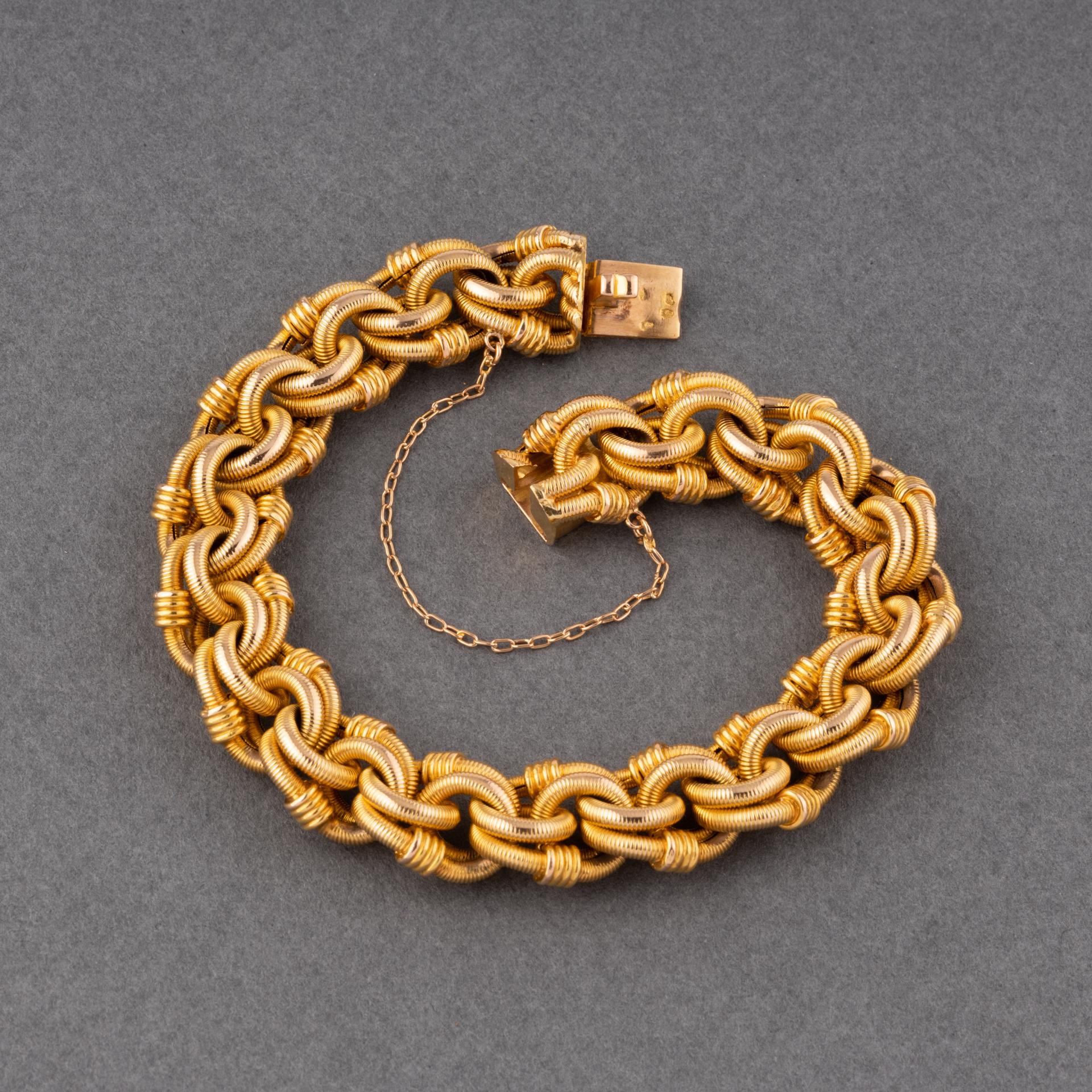 A lovely antique bracelet, made in France circa 1890.
Made in yellow gold 18k, multiple hallmarks (eagle head/rhino head).
The size is quite big 18.5 cm.
The width of bracelet is 13mm.
Weight: 35.70 grams.
