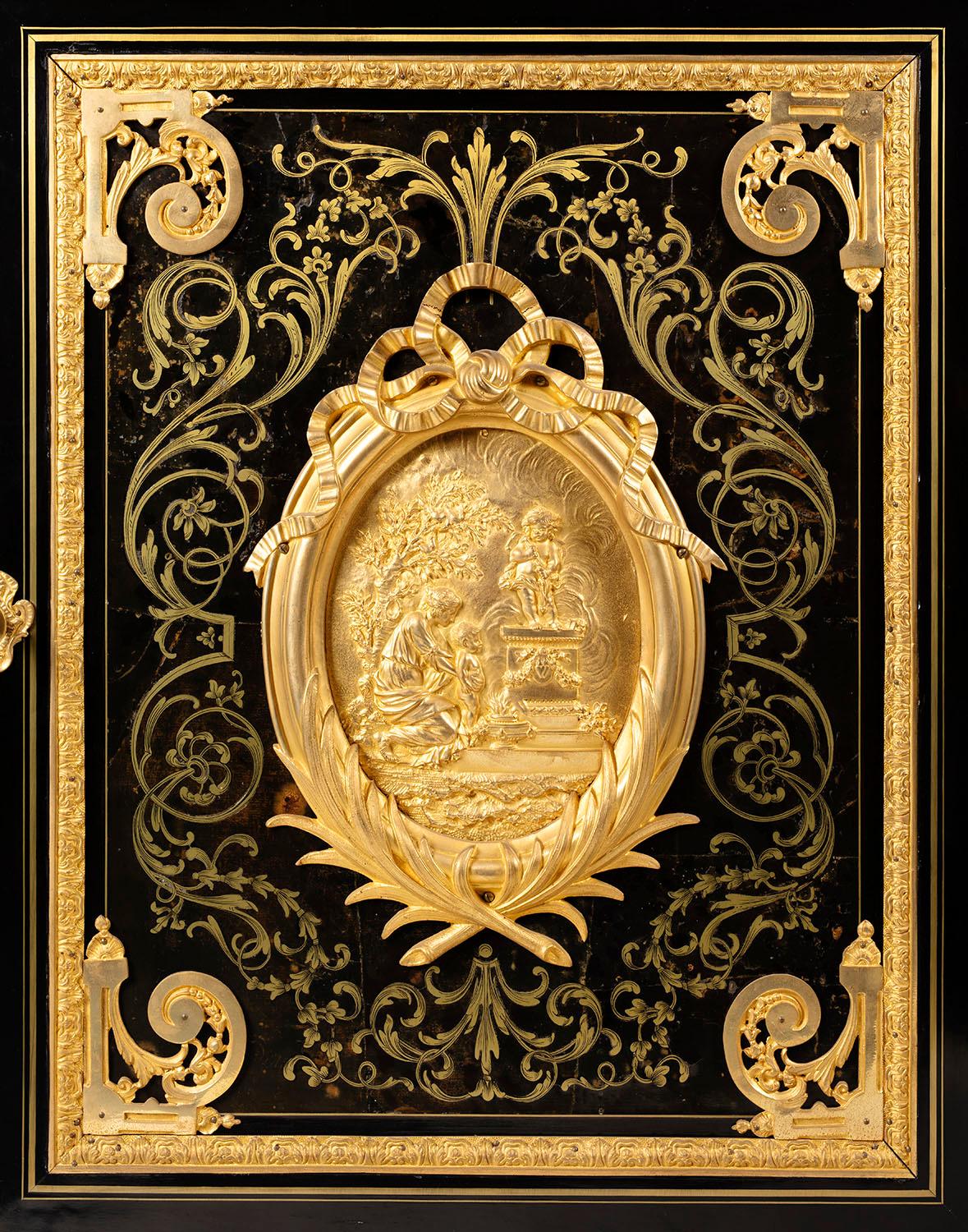 A sensational  hight quality  french 19th century Napoleon third peroid ,ebony and bronze cabinet a hauteur d appui inlaid with brass ,marble top
the boulle cabinet have an important medallion in bronze depicting a women with two cherub in a garden