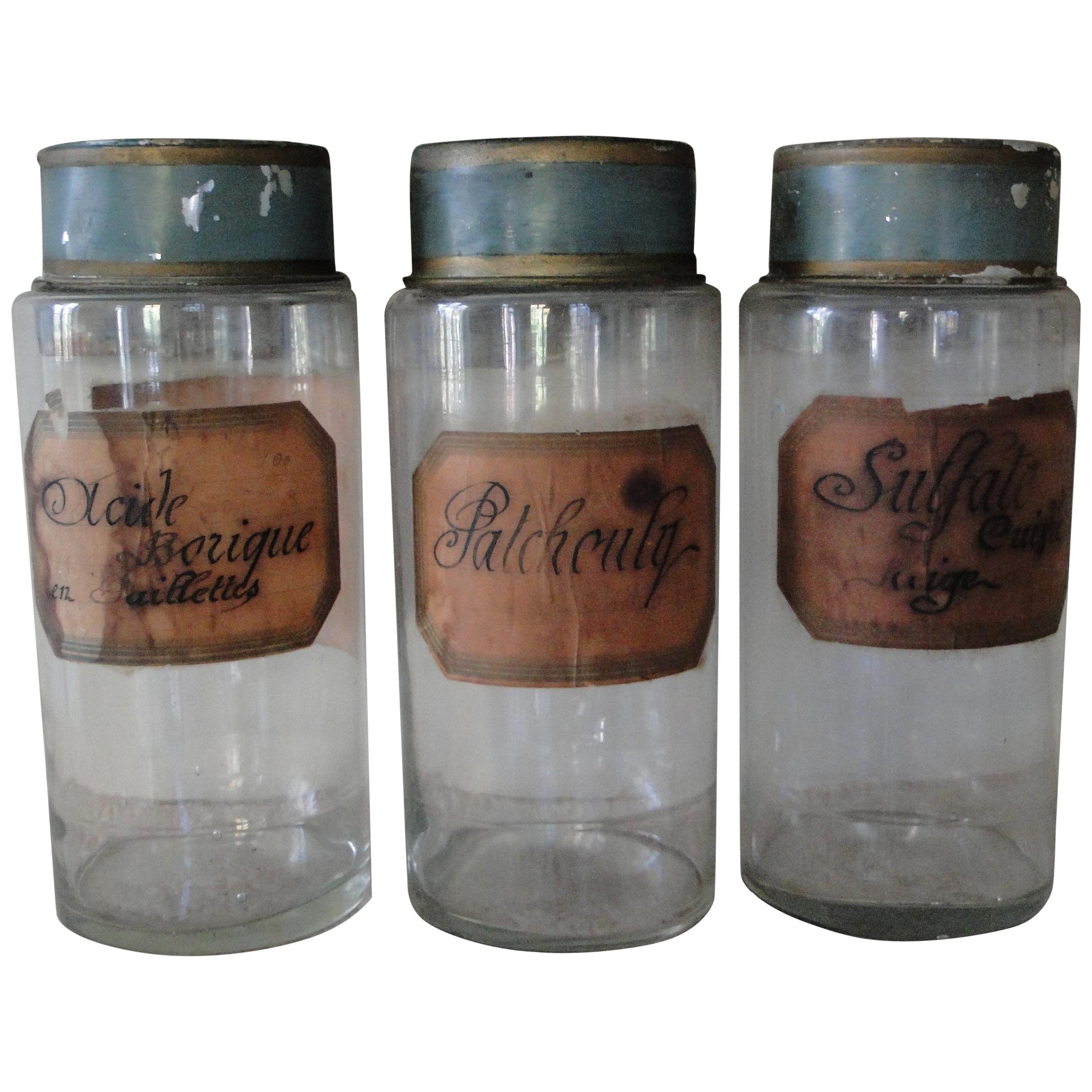 French Apothecary Glass Jars with Original Handwritten Label and Painted Tin Lid For Sale