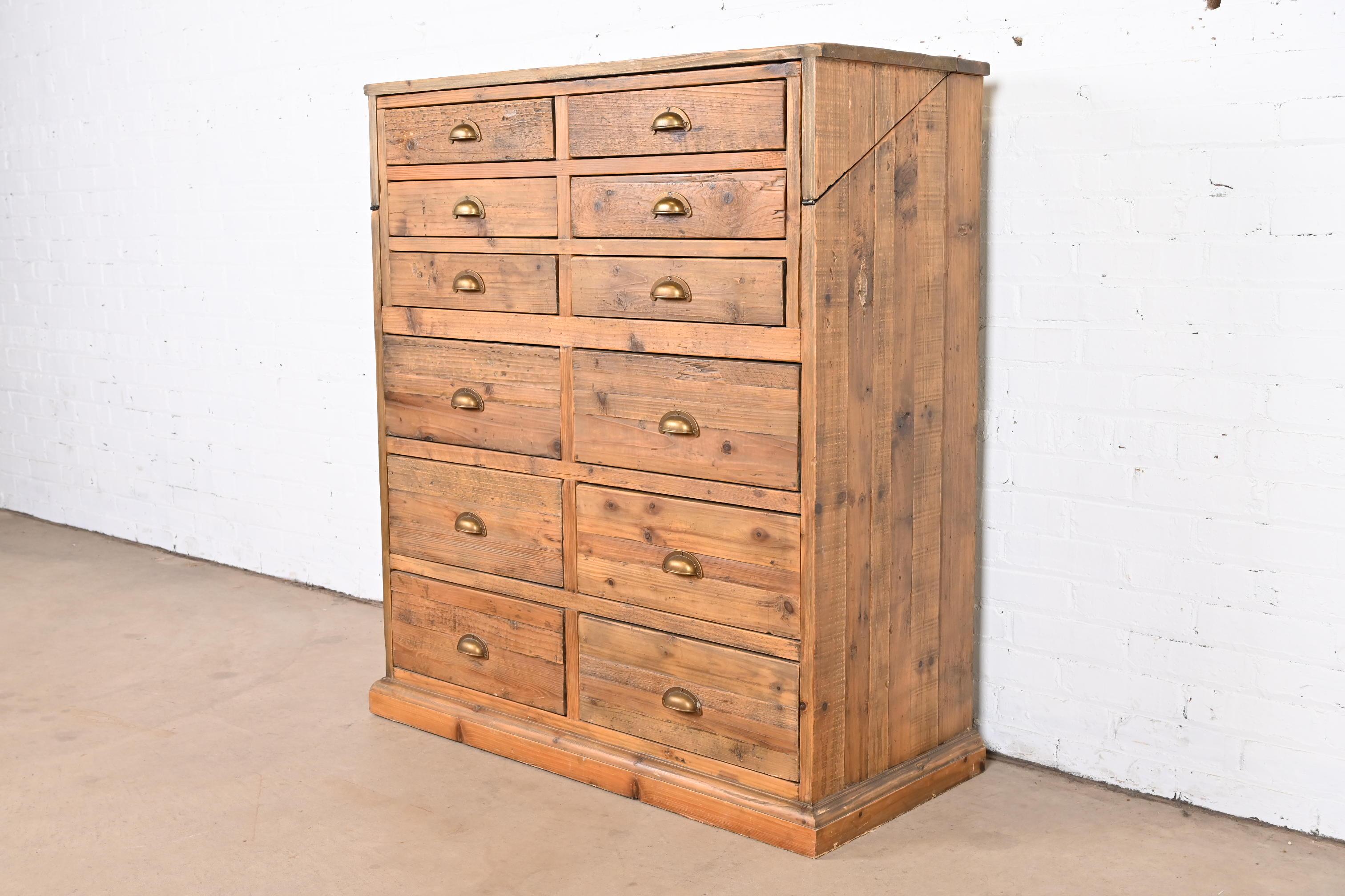 French Apothecary Style Rustic Pine Twelve-Drawer Chest of Drawers In Good Condition For Sale In South Bend, IN