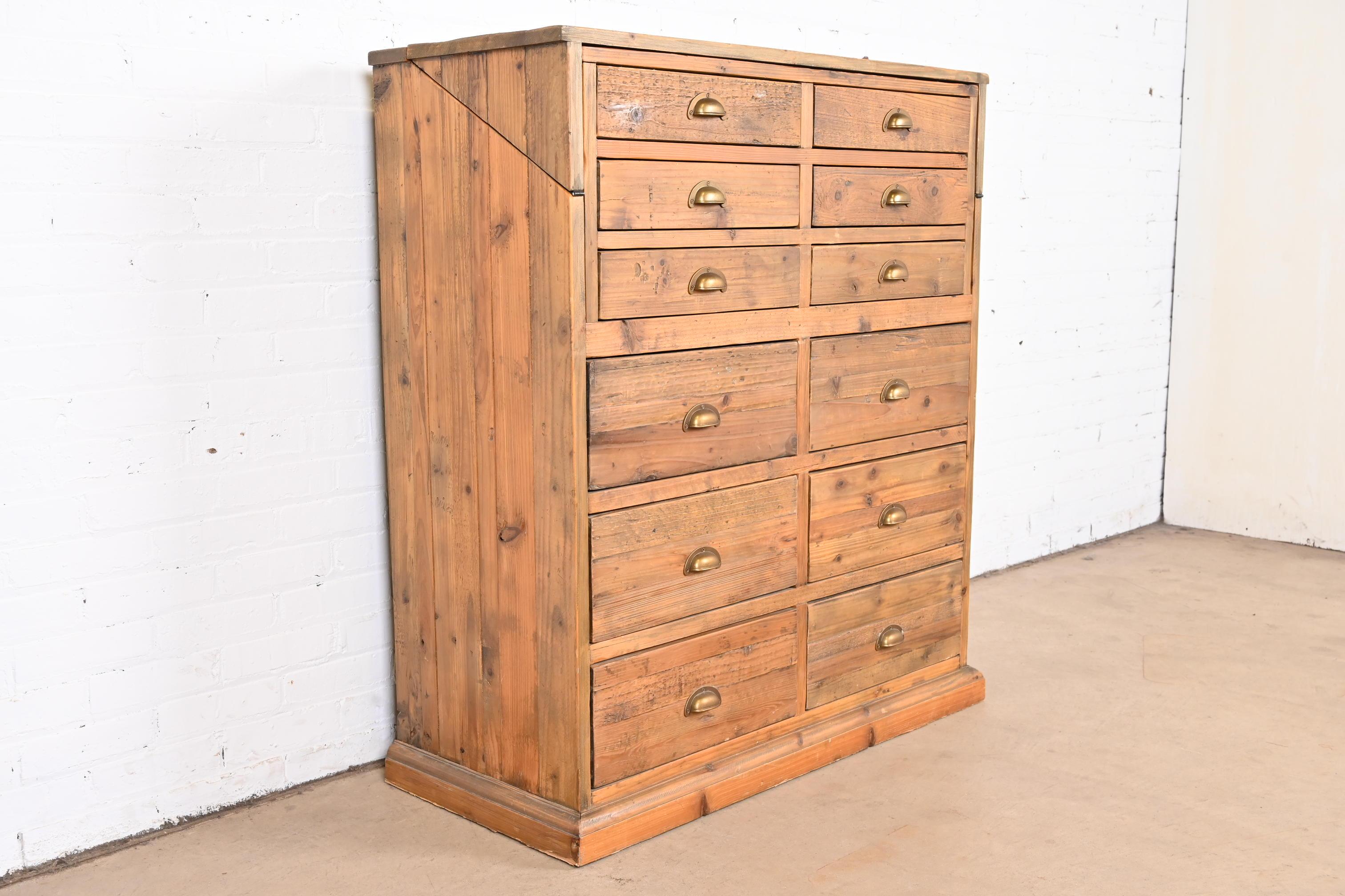 French Apothecary Style Rustic Pine Twelve-Drawer Chest of Drawers In Good Condition In South Bend, IN
