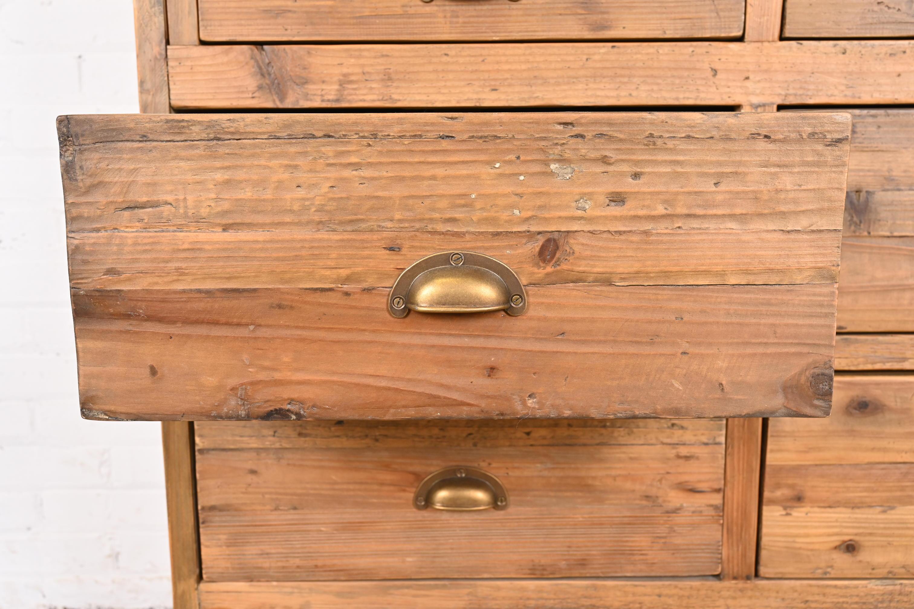 French Apothecary Style Rustic Pine Twelve-Drawer Chest of Drawers For Sale 1