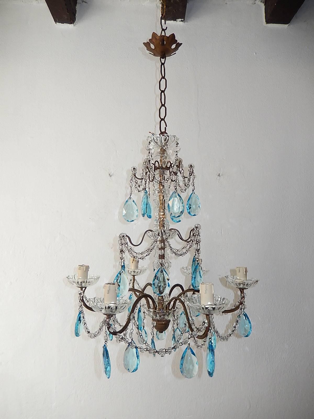 Housing six lights sitting in crystal bobeches. Murano glass centre. Rewired and ready to hang. Swags of macaroni crystal beads with rare aqua crystal prisms. Bobeches on top, middle and bottom. Also a giltwood finial. Adding another 9 inches of