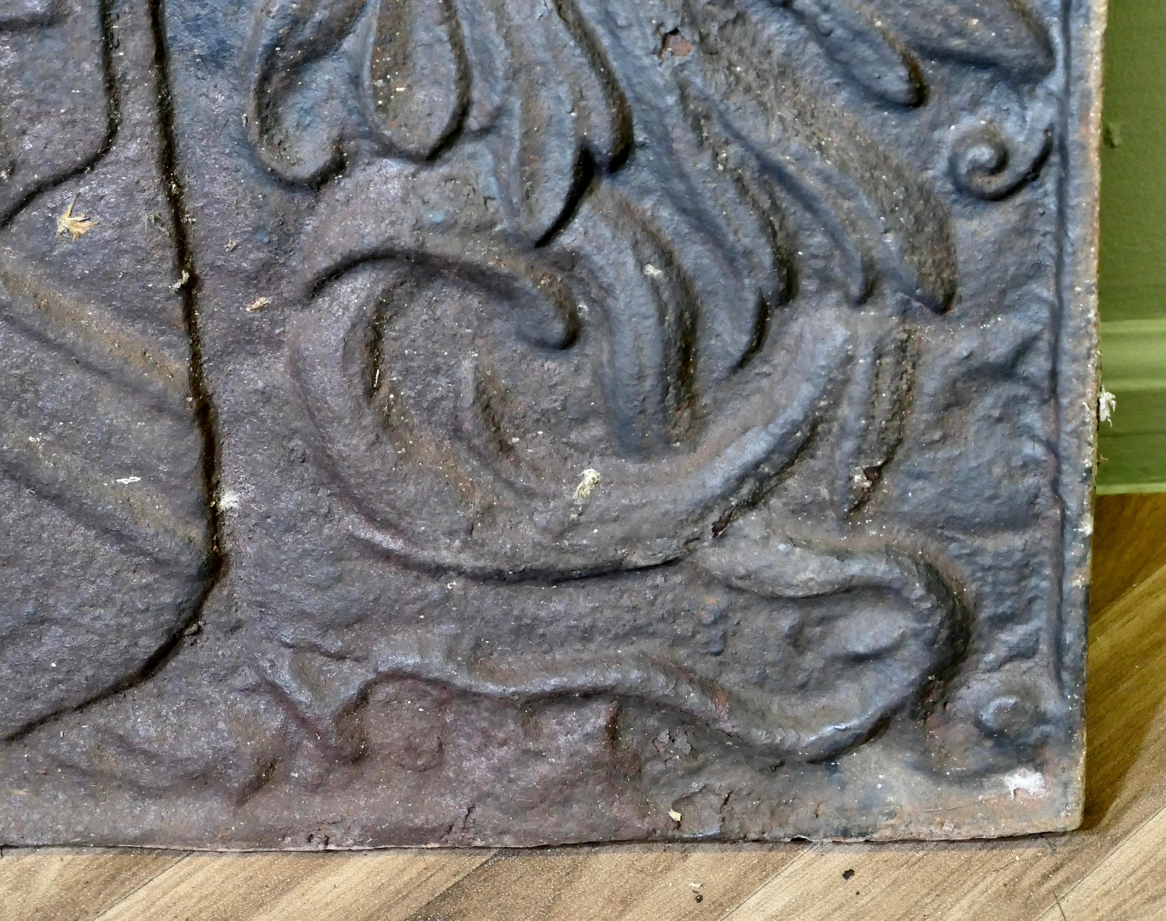 19th Century French Arch Top Fire Back. Armour and Eagle For Sale