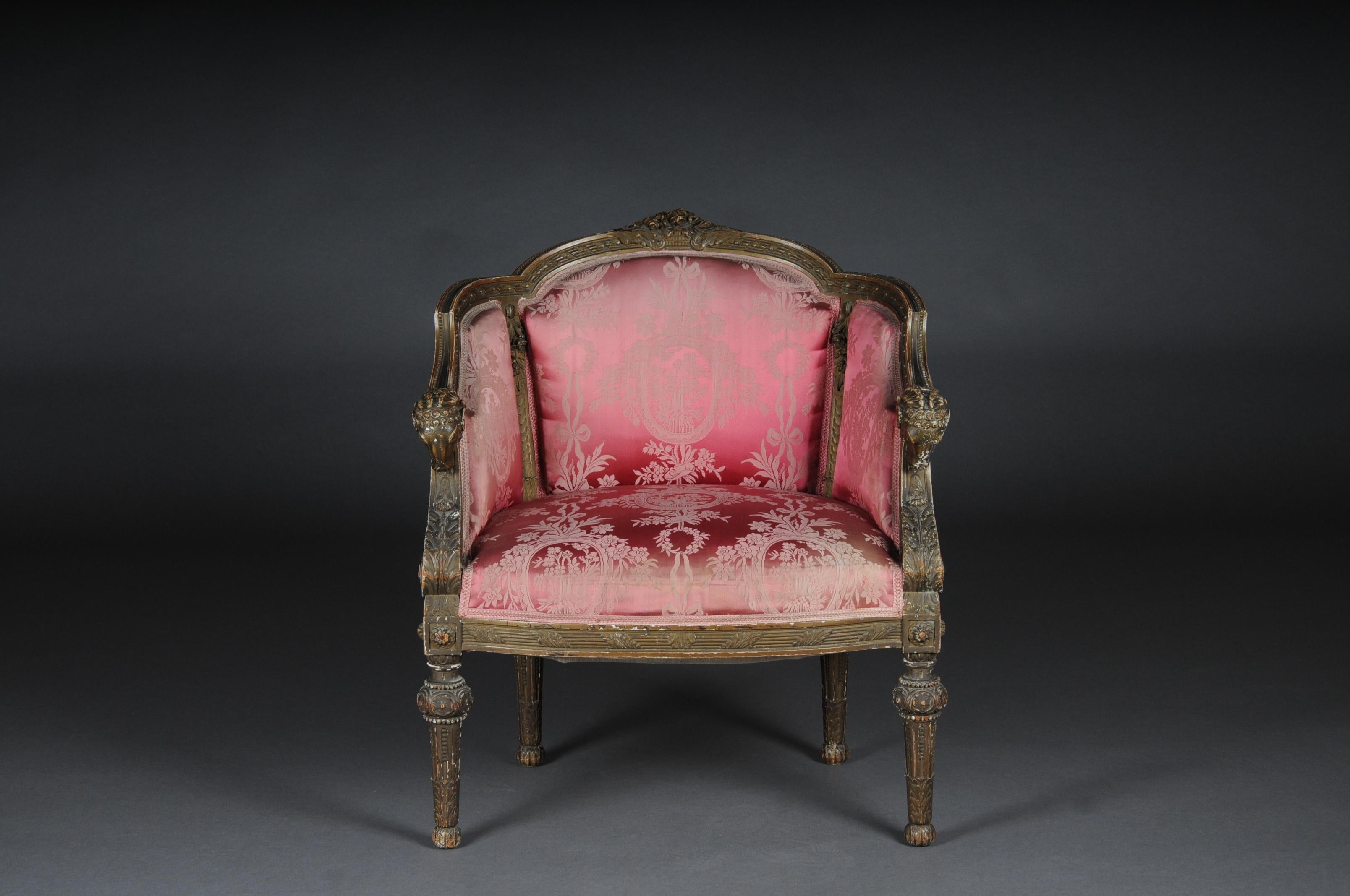 French armchair / armchair / bergère Napoleon III

Solid wood, carved, painted in gold.
Slightly curved frame on fluted legs. Slanted, fluted, slightly rising armrests. Curly, backrest framing. The seat and backrest are finished with historical,