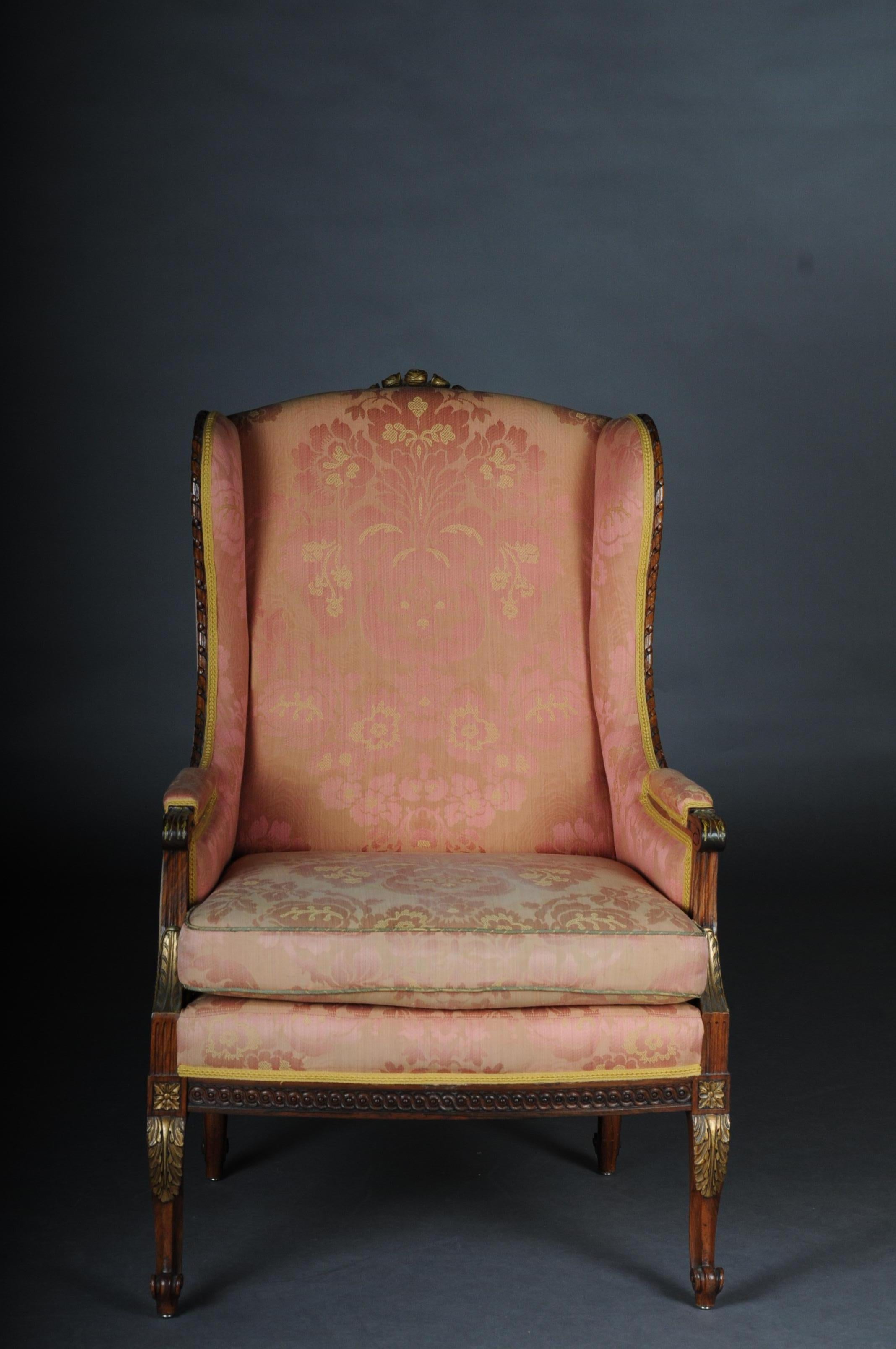 French armchair upholstered armchair, circa 1900

Hand carved solid wood, partially gilded. Classic upholstery. Straight frame on curly feet. Seat and backrest are finished with a historical, Classic upholstery.

(B - 152)
Seat height 52 cm.
