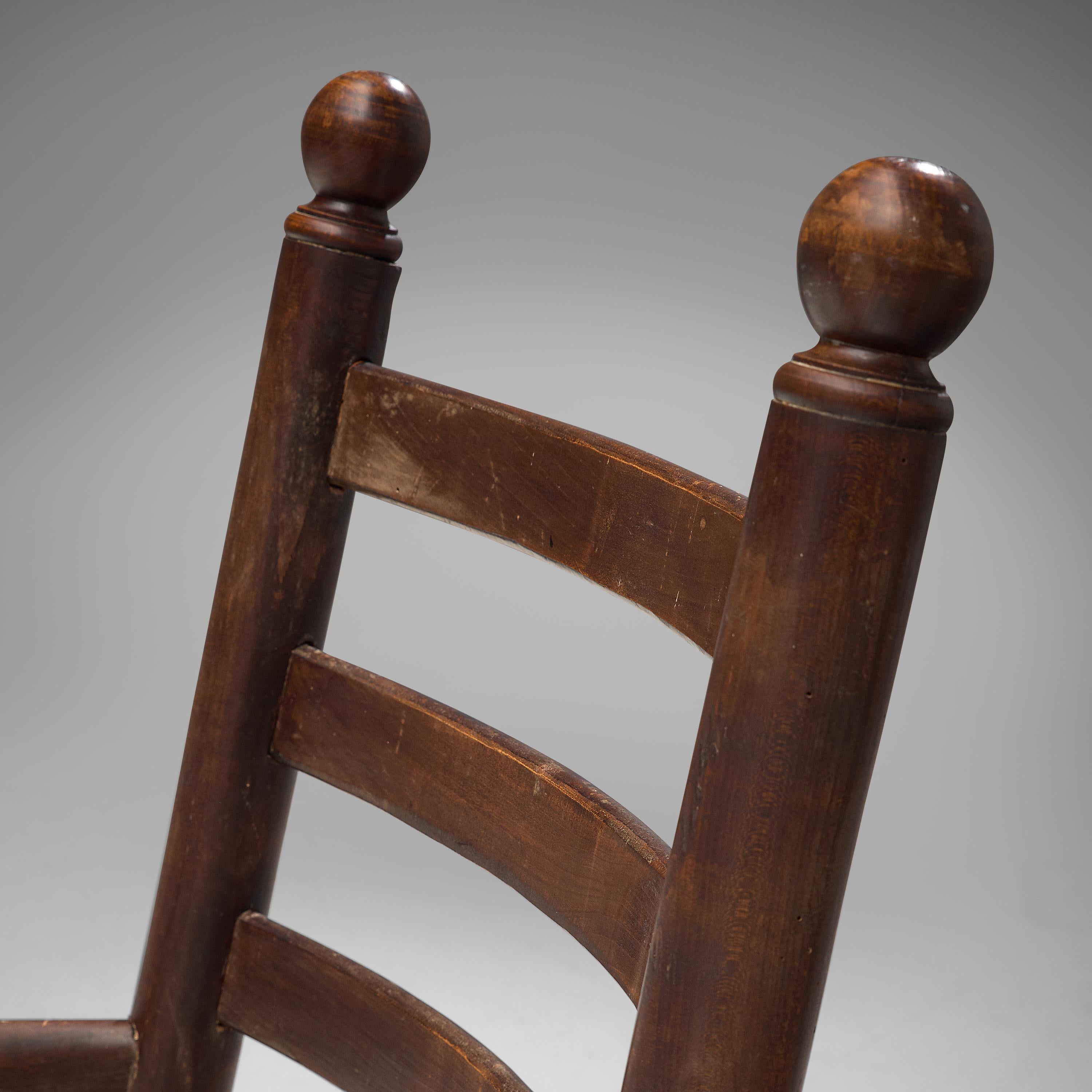 Mid-20th Century Rustic Pair of French Lounge Chairs in Stained Wood and Cane 