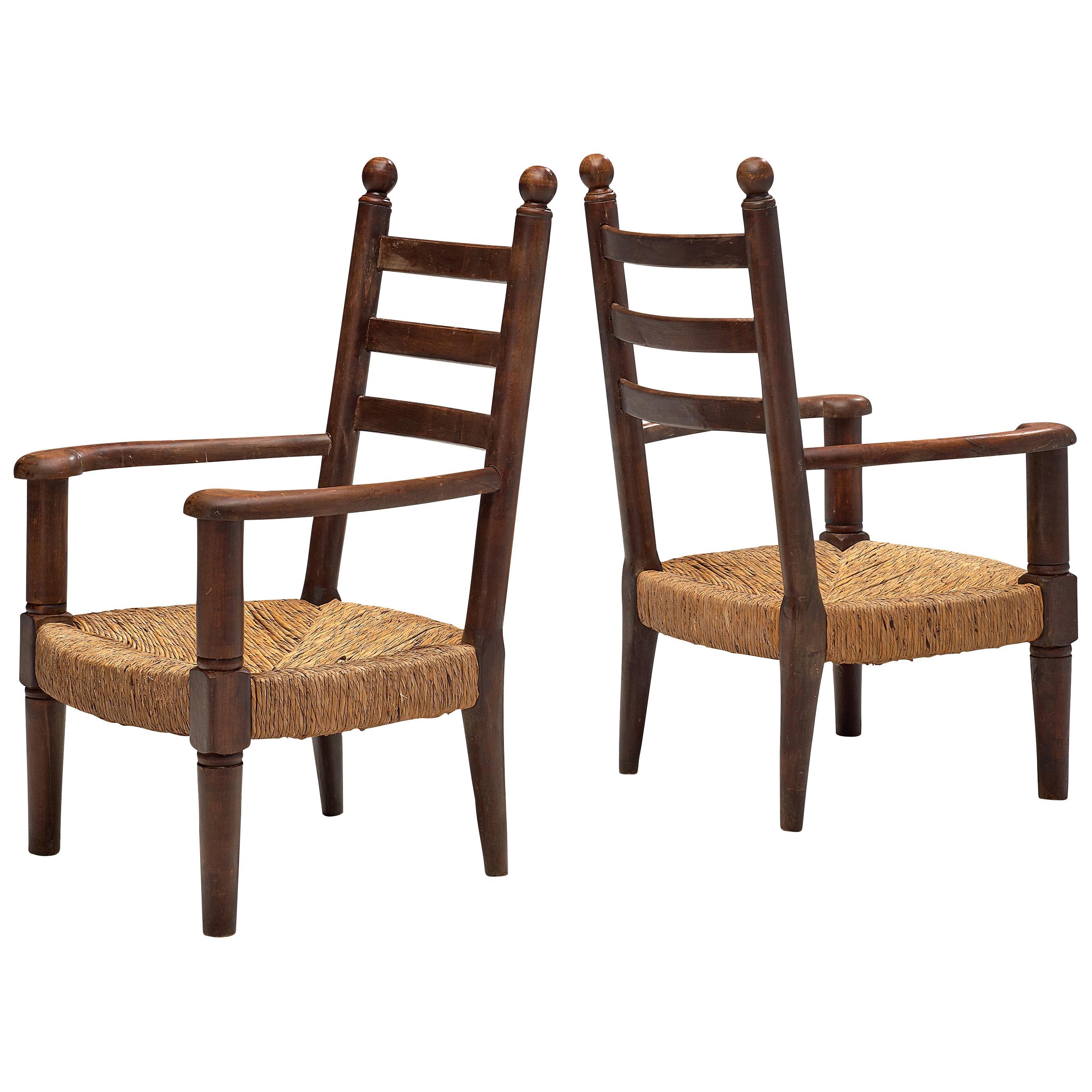 Rustic Pair of French Lounge Chairs in Stained Wood and Cane 