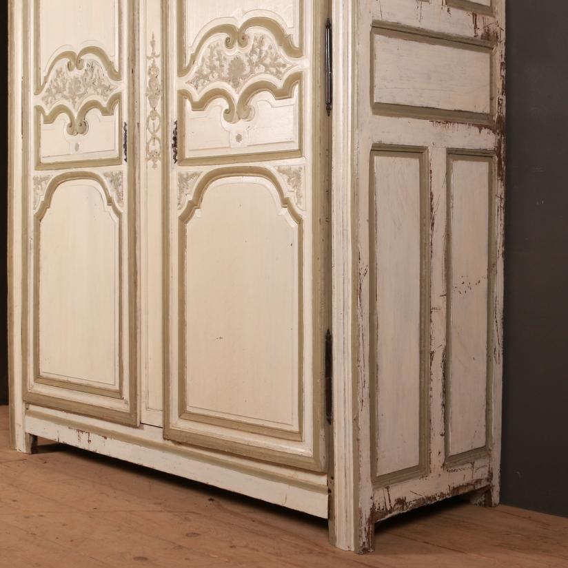 Good 18th century French painted oak armoire, 1760

Dimensions:
70 inches (178 cms) wide
27.5 inches (70 cms) deep
93 inches (236 cms) high.
 
 