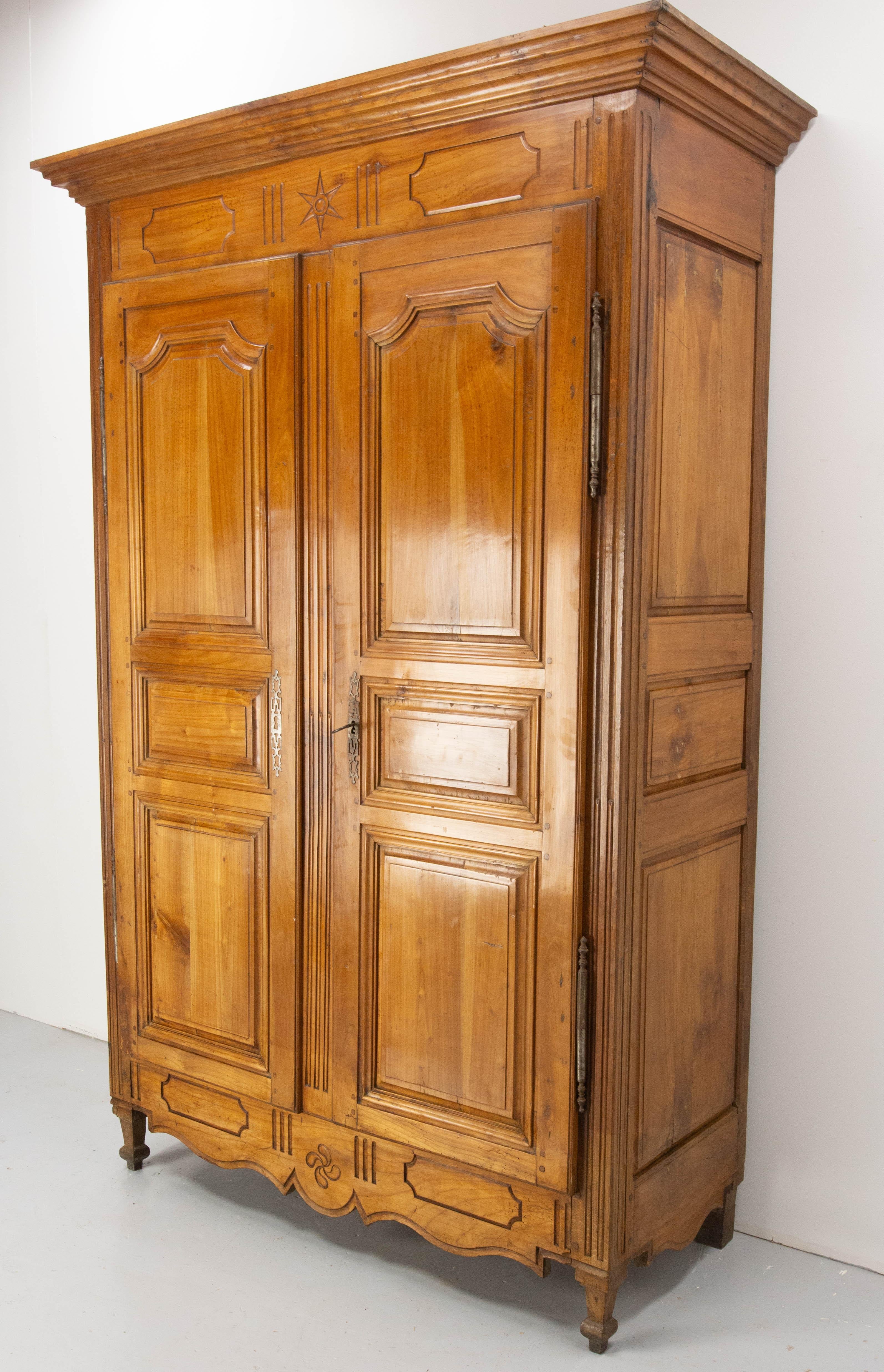 French wardrobe Louis XVI style cherrywood armoire
In wealthy families, wardrobes were given as gifts to newlyweds. They contained all the household linen for future years.
The special feature of this wardrobe is the part that could be locked, to