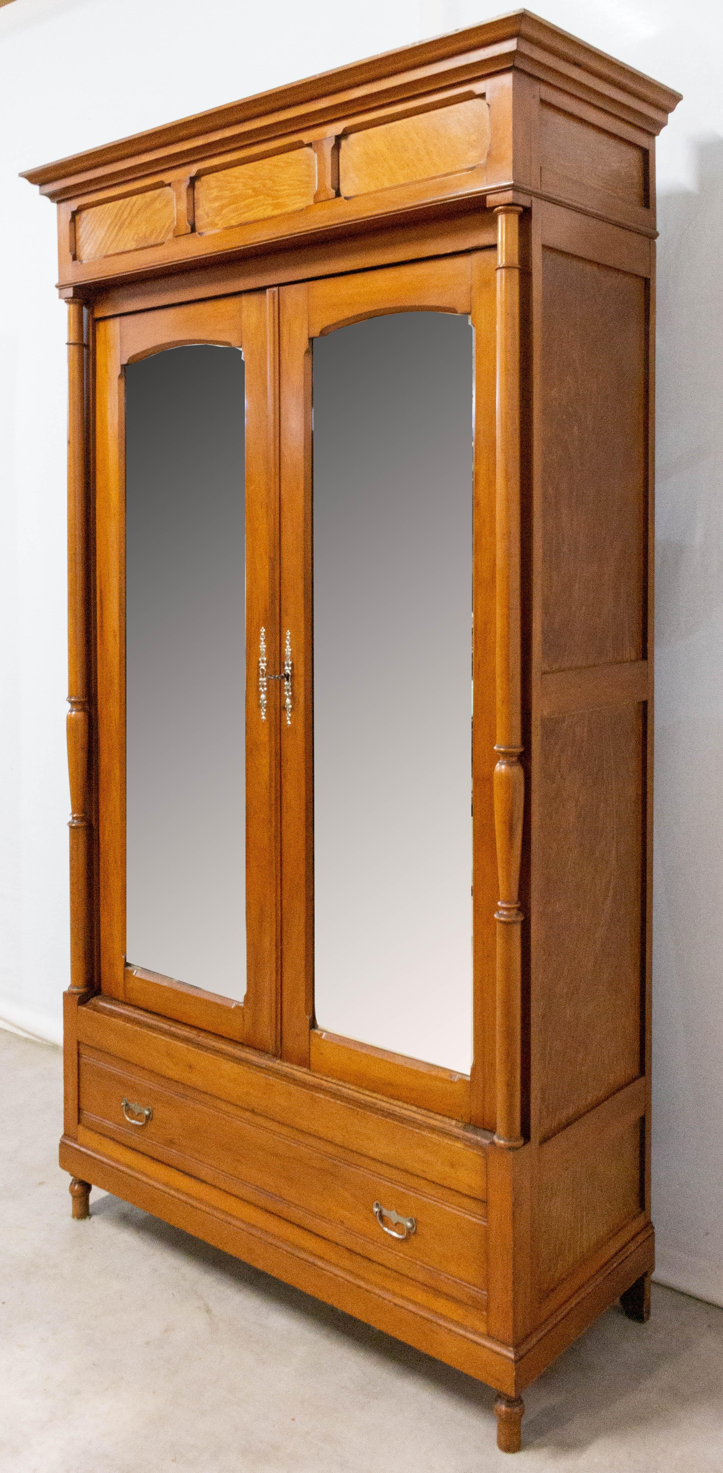 wardrobe closet with mirror doors