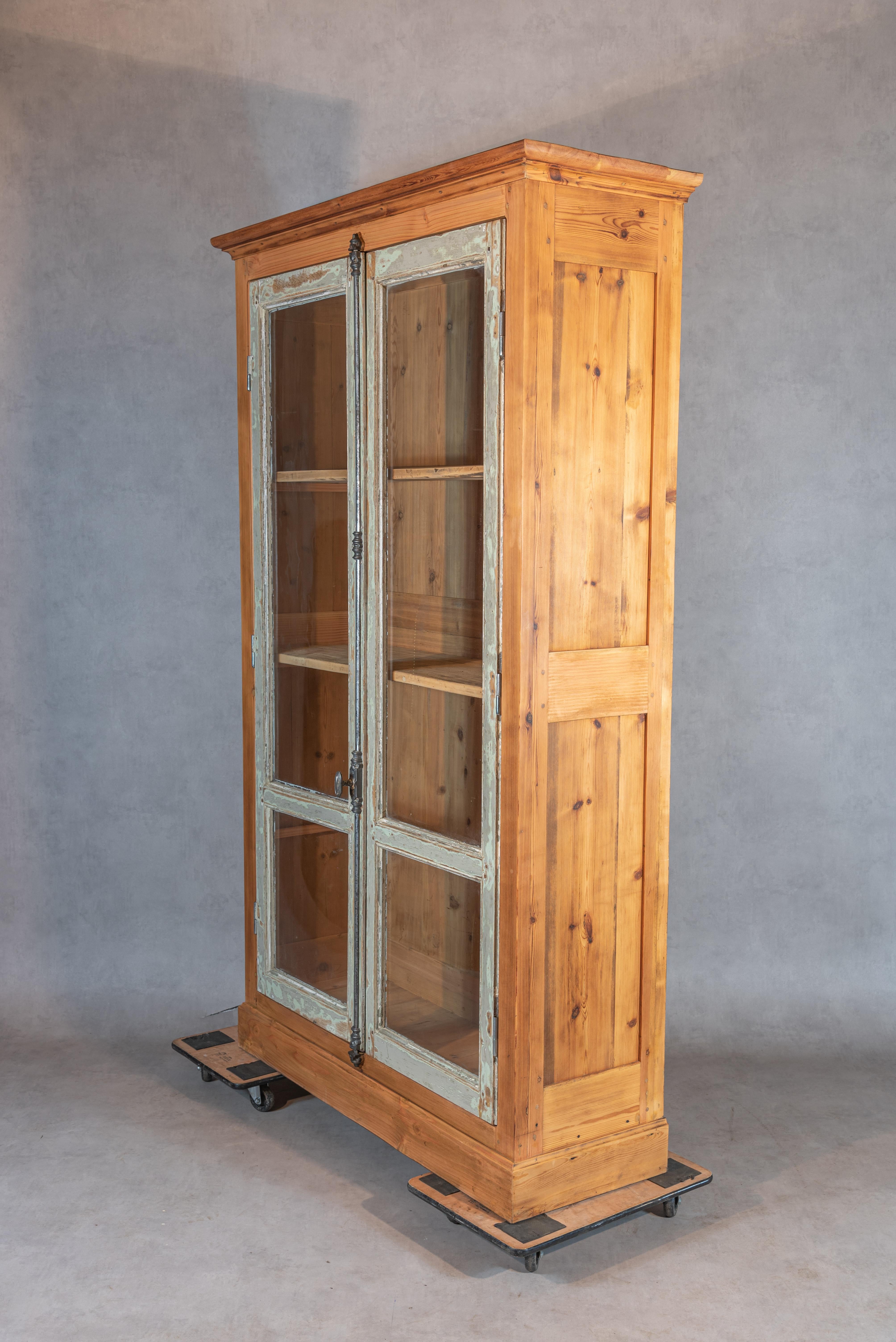 This armoire is one part of our rethought antique lineup. In this case, we took authentic 19th-century windows serving as the main doors. These windows came from a 