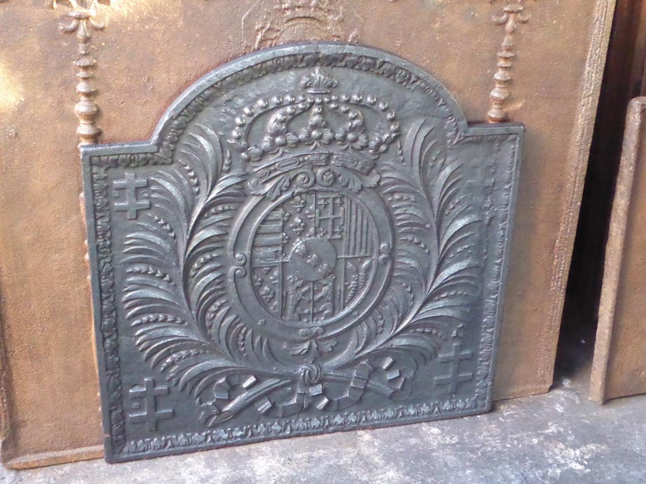 18th century French fireback with the Arms of Lorraine. The arms are flanked by olive branches which symbolize peace and victory.







 