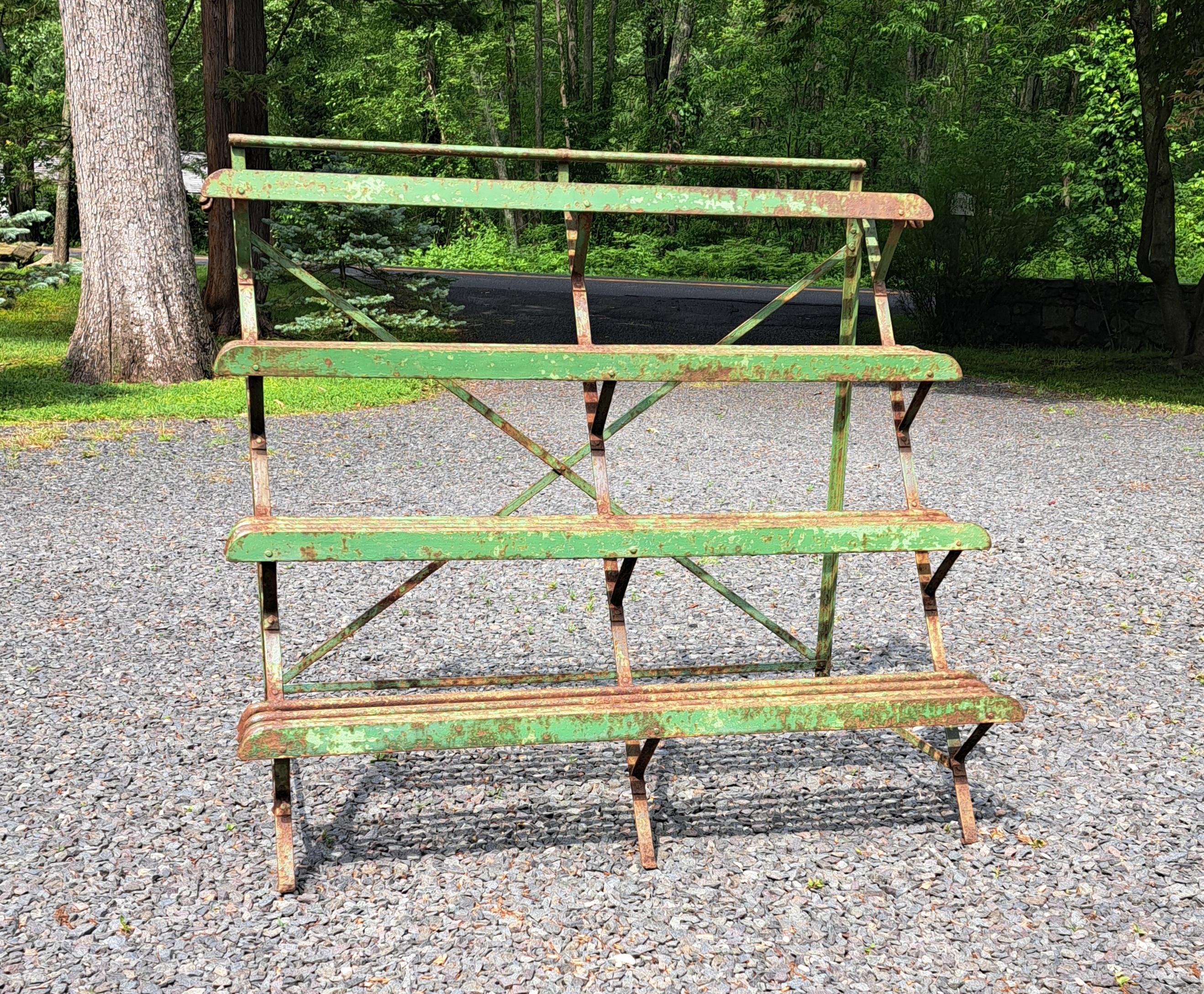 Antique French Arras 4 shelf iron Plantstand.  Iron stand with half tube shelves to allow water to run off.  Riveted construction.  It is 43.5