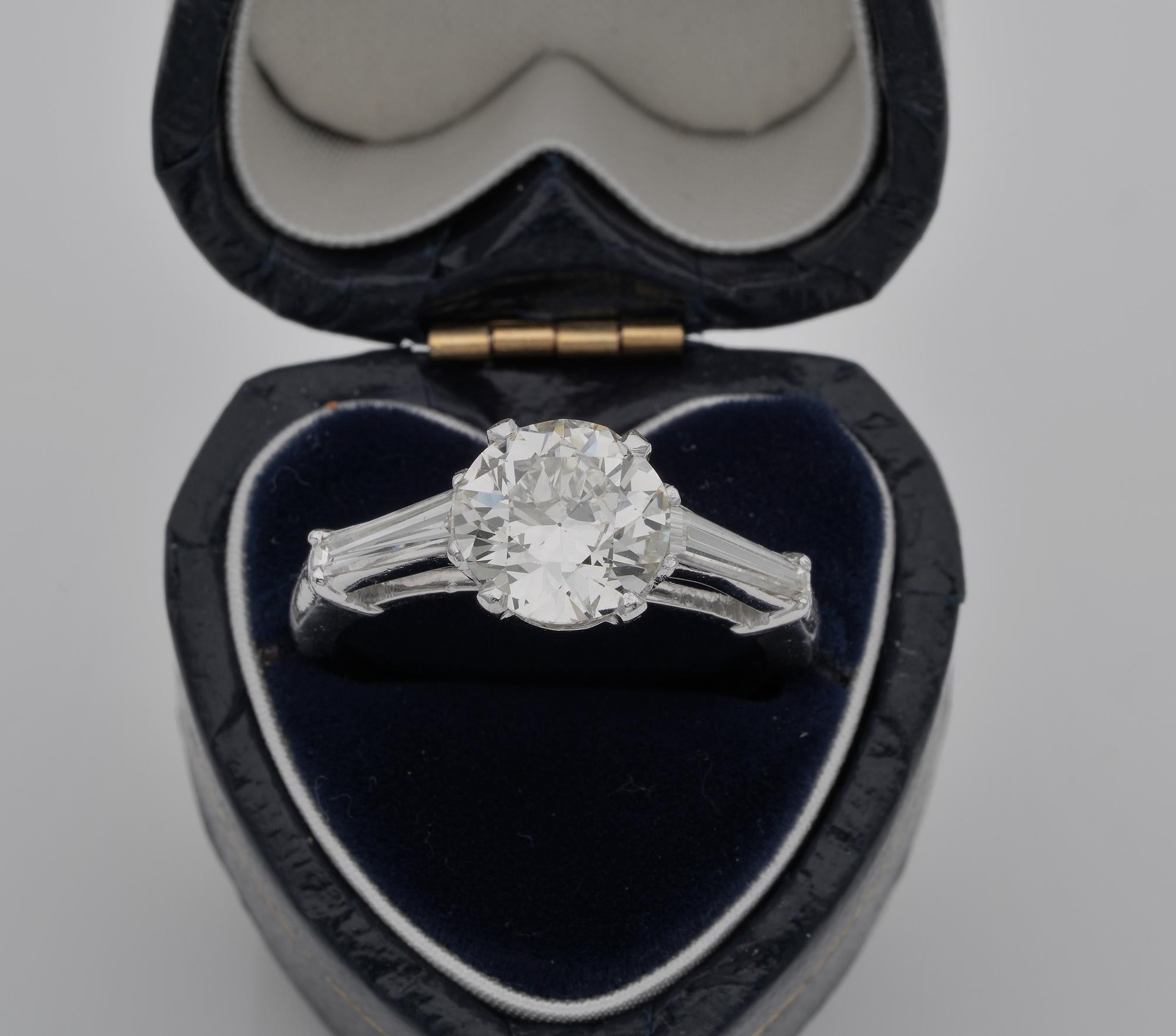 Ultra Deco
This marvellous Art Deco Diamond solitaire ring is French origin
Finely hand-fabricated in gleaming platinum during the 20’s – bearing French marks
Traditional ever loved setting holding a centre Diamond with two tapered baguette Diamond