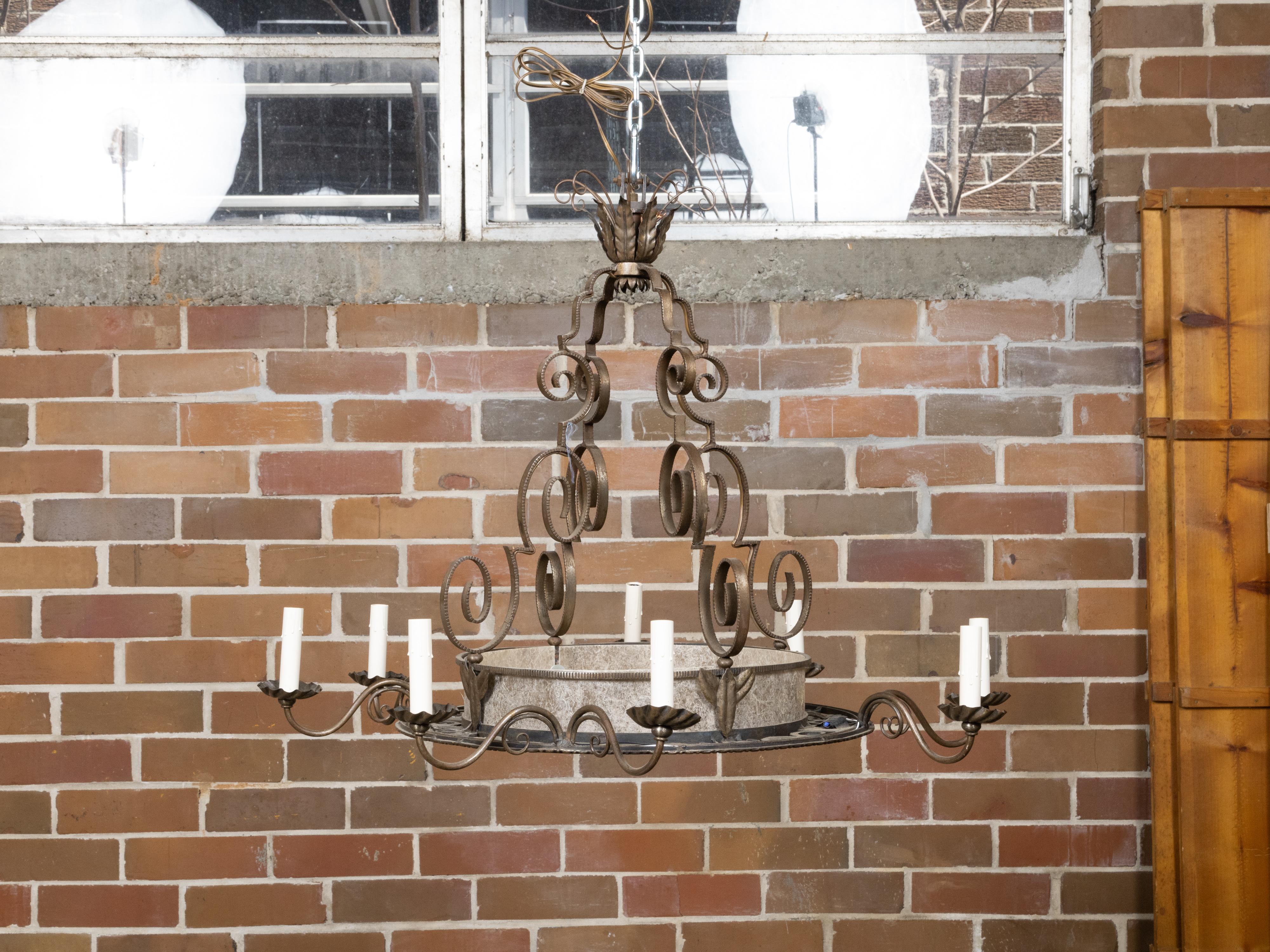 20th Century French Art Deco 1920s Iron Chandelier Eight Light Chandelier with Scrolling Arms For Sale