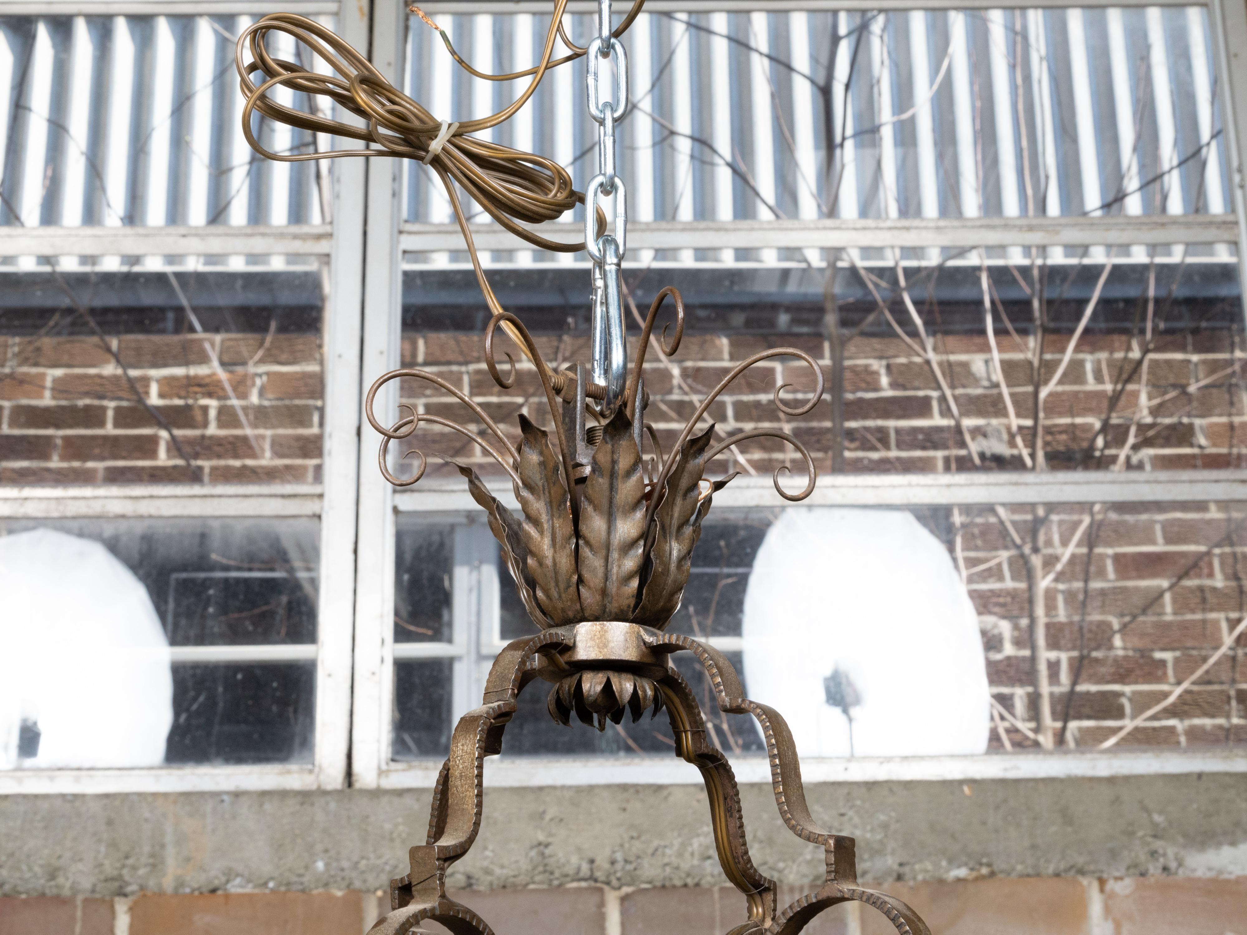 French Art Deco 1920s Iron Chandelier Eight Light Chandelier with Scrolling Arms For Sale 1