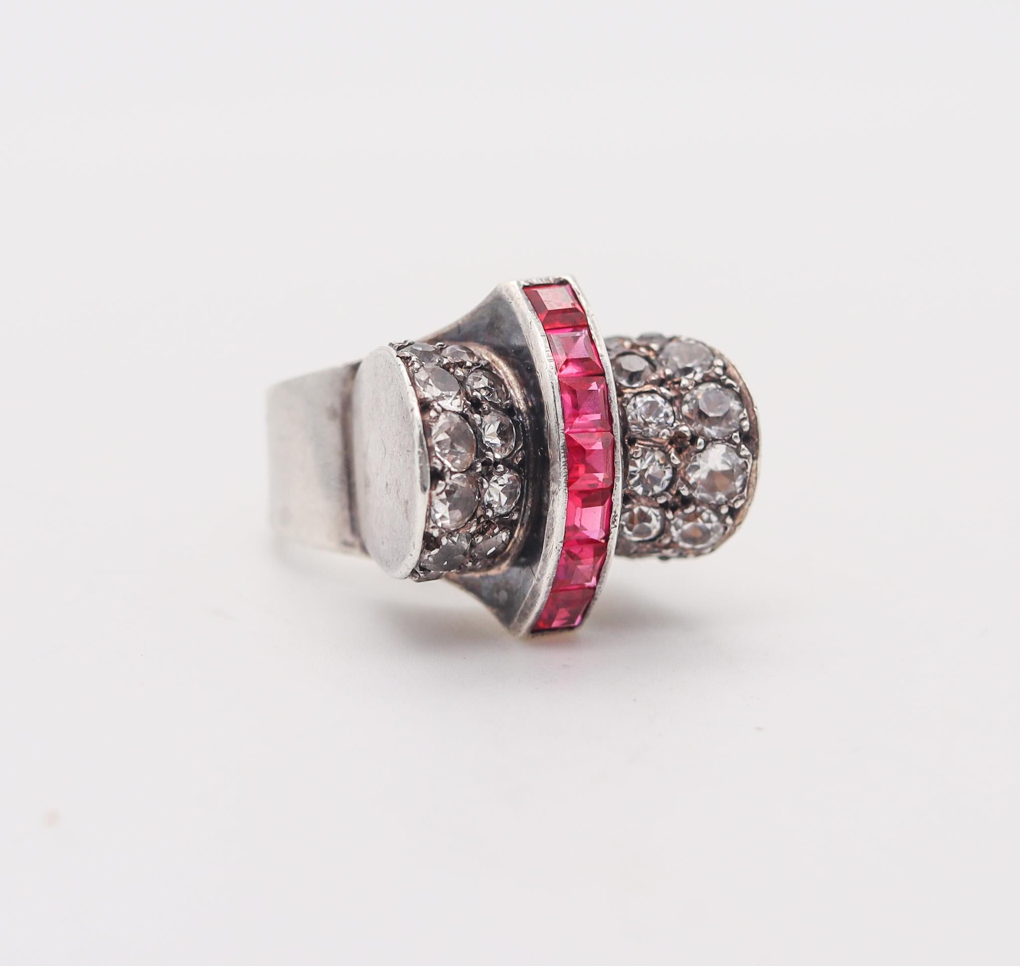 An art deco ring made in France by Maurice Chardeaux.

Beautiful cocktail ring, created in Paris France during the art deco period, back in the 1930. This ring has been crafted by the Parisian silversmith Maurice Chardeaux with symmetrical and