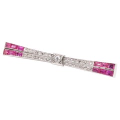 French Art Deco 1930s Platinum Diamond and Ruby Stylised Bow Brooch