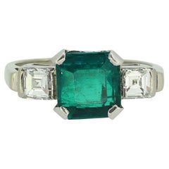 Antique French Art Deco 2.00 Carat Emerald and Diamond Three-Stone Ring