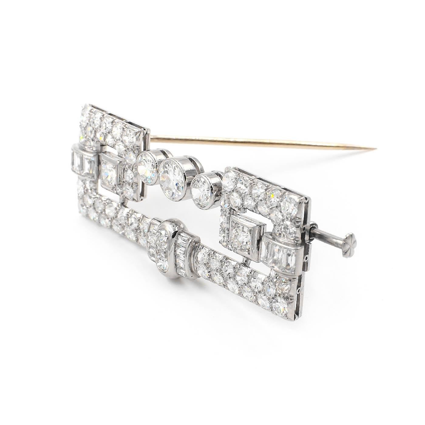 French Art Deco era 4.50 Ctw. Diamond Geometric Brooch composed of platinum and 18k white gold. Featuring 3 Transitional Round Cut diamonds estimated to weigh approximately 1.00 carat in total. With an additional 76 diamonds accenting the brooch, a