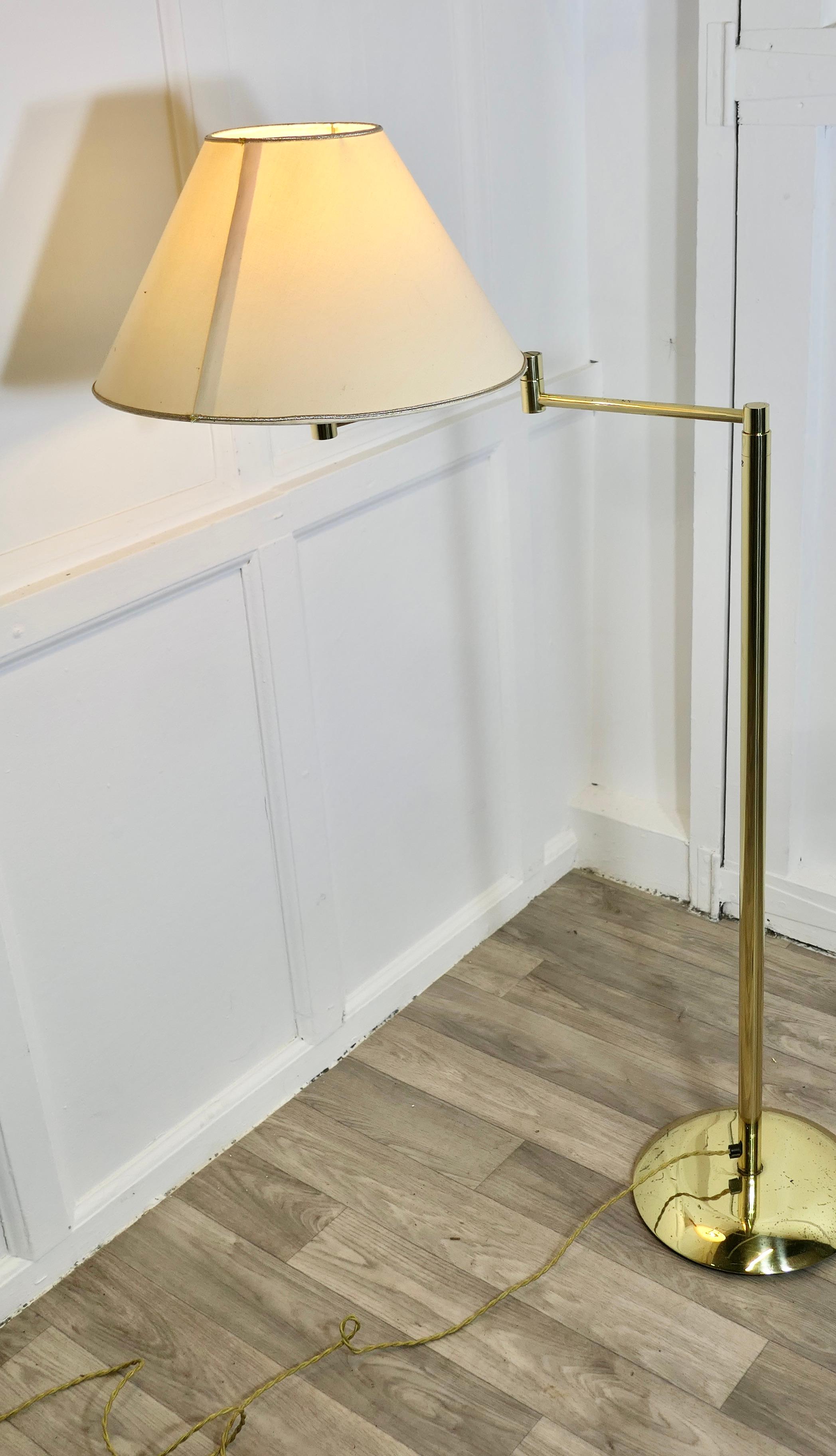  
 French Art Deco Adjustable Height Swing Arm Floor Lamp 

This is a beautifully designed piece, the lamp has a round base and a  telescopic brass Swing Arm, the height of the upright can be altered as can the angle of the lamp
We have matched it