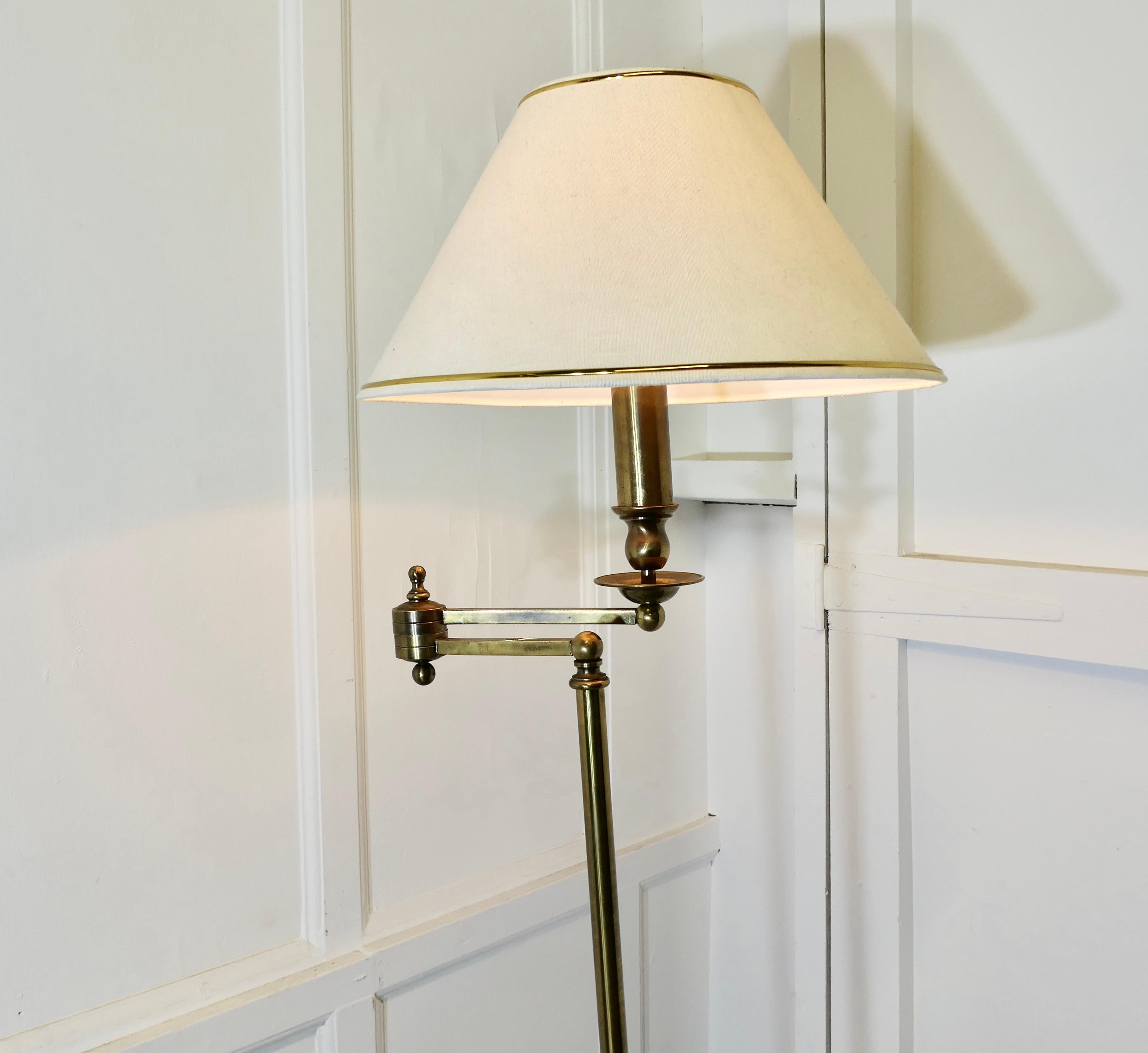  French Art Deco Adjustable Swing Arm Floor Lamp, Reading Lamp 

This is a beautifully designed piece, the lamp is heavy brass with an adjustable Swing Arm on a full height column, this can be moved to adjust the position of the light
The lamp is in