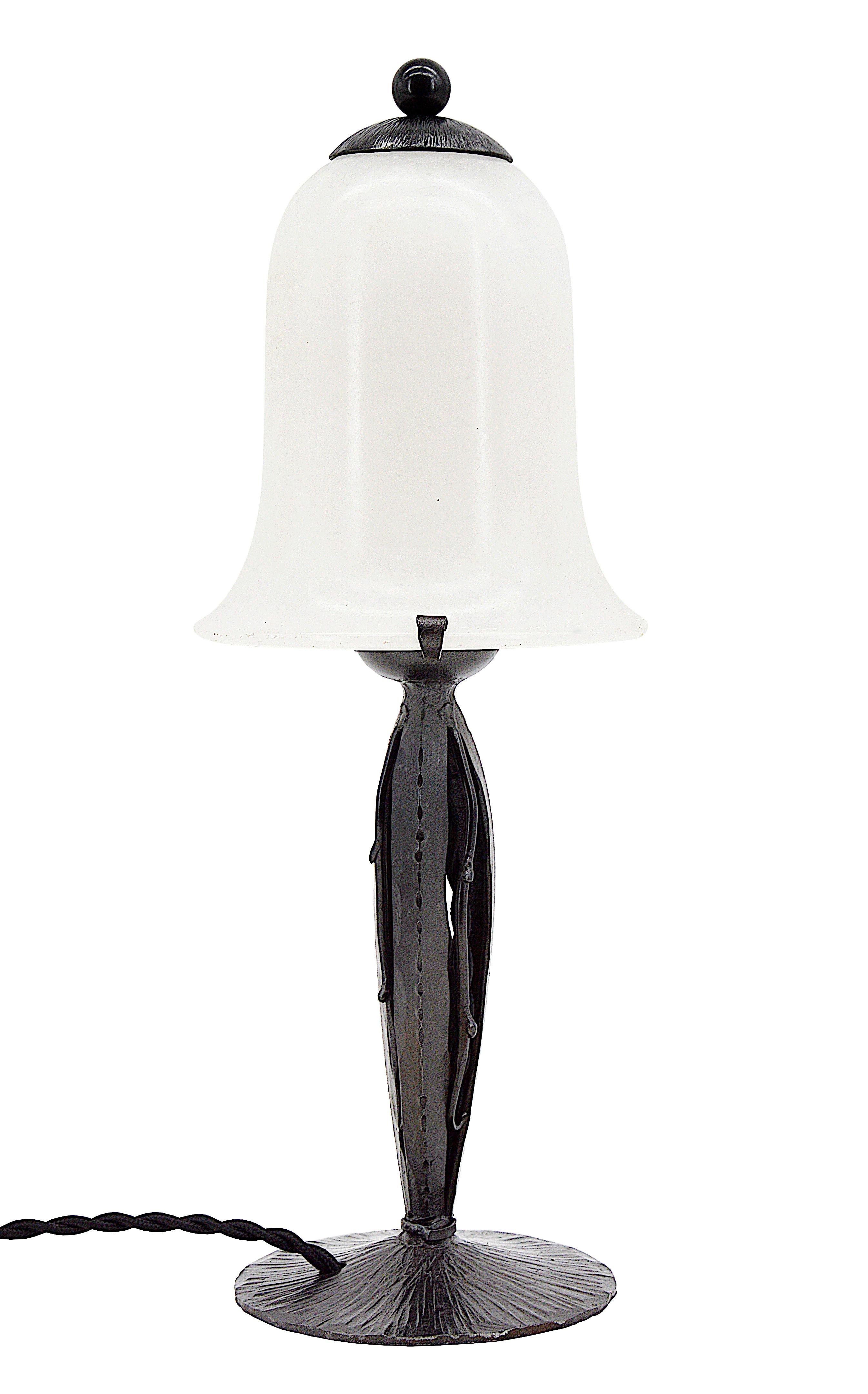 French Art Deco table lamp, France, 1920s. Wrought-iron base. Alabaster shade. Measures: Height 12.3