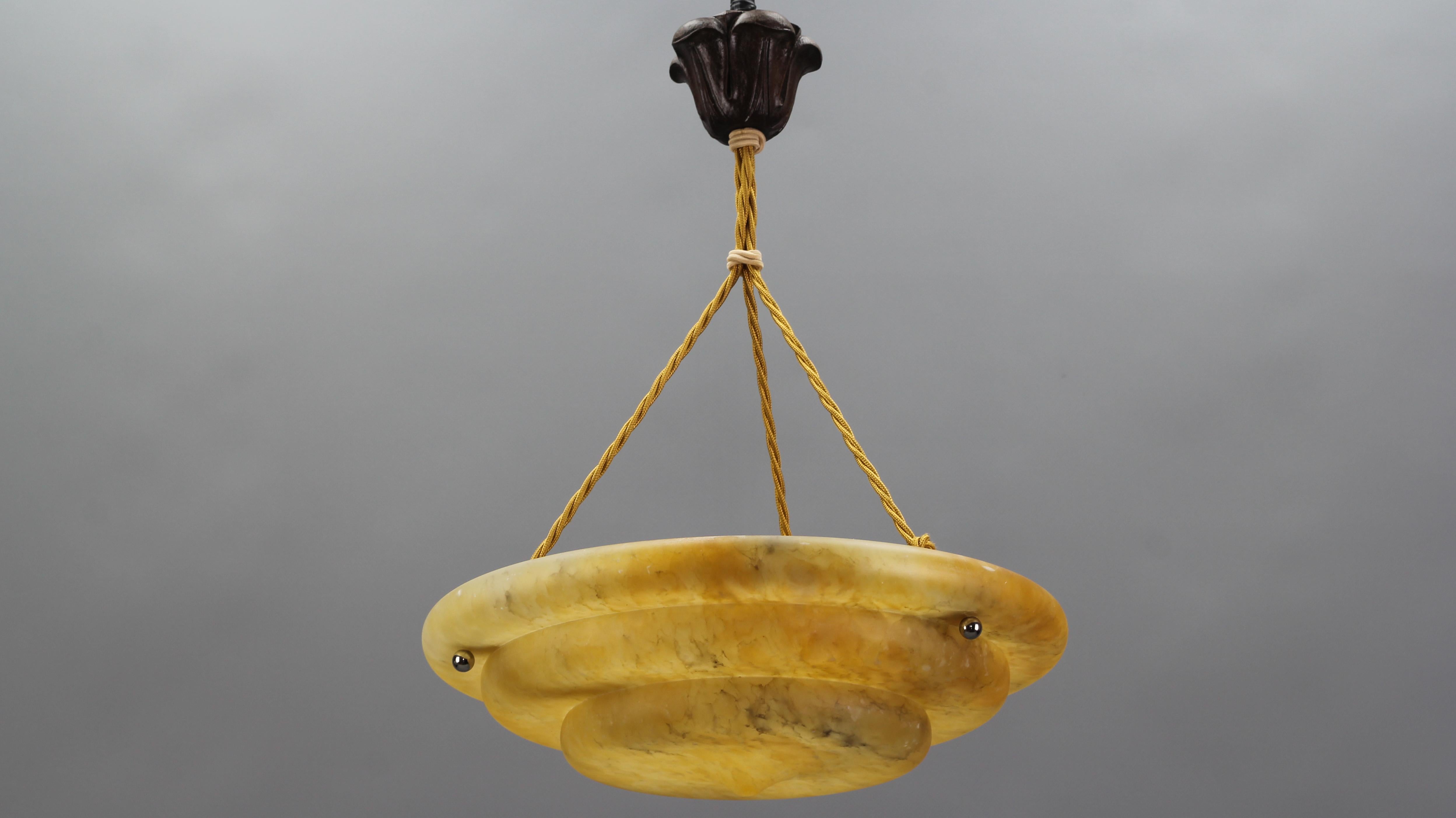 French Art Deco Amber Color Alabaster Three-Light Pendant Light Fixture, 1930s In Good Condition In Barntrup, DE