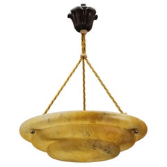 French Art Deco Amber Color Alabaster Three-Light Pendant Light Fixture, 1930s