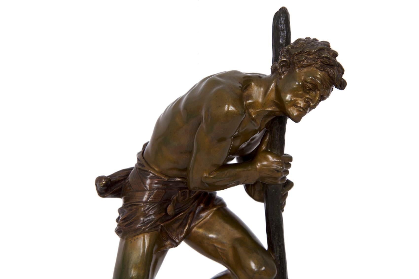 In this exquisitely chiselled bronze sculpture, Edouard Drouot explores a topic of great interest during the Art Deco movement - the industry of man. The lone figure struggling against the earth is clothed only in a tucked waist cloth as he drives