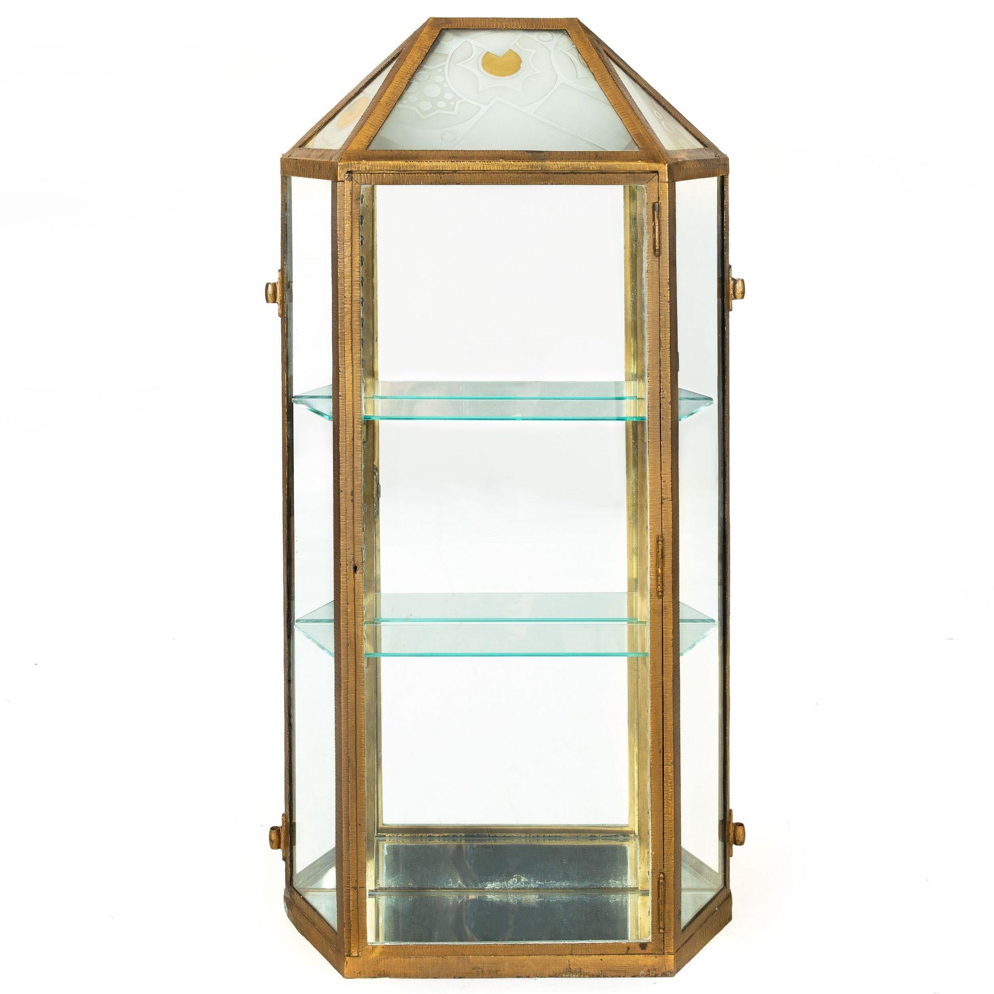 ART DECO GILDED IRON, BRASS AND ACID-ETCHED GLASS HANGING DISPLAY CABINET
France, circa 1930s
Item # 209FRI22L 

An absolutely gorgeous collector's display cabinet of the Art Deco period in France, it features acid-etched glass with gilded