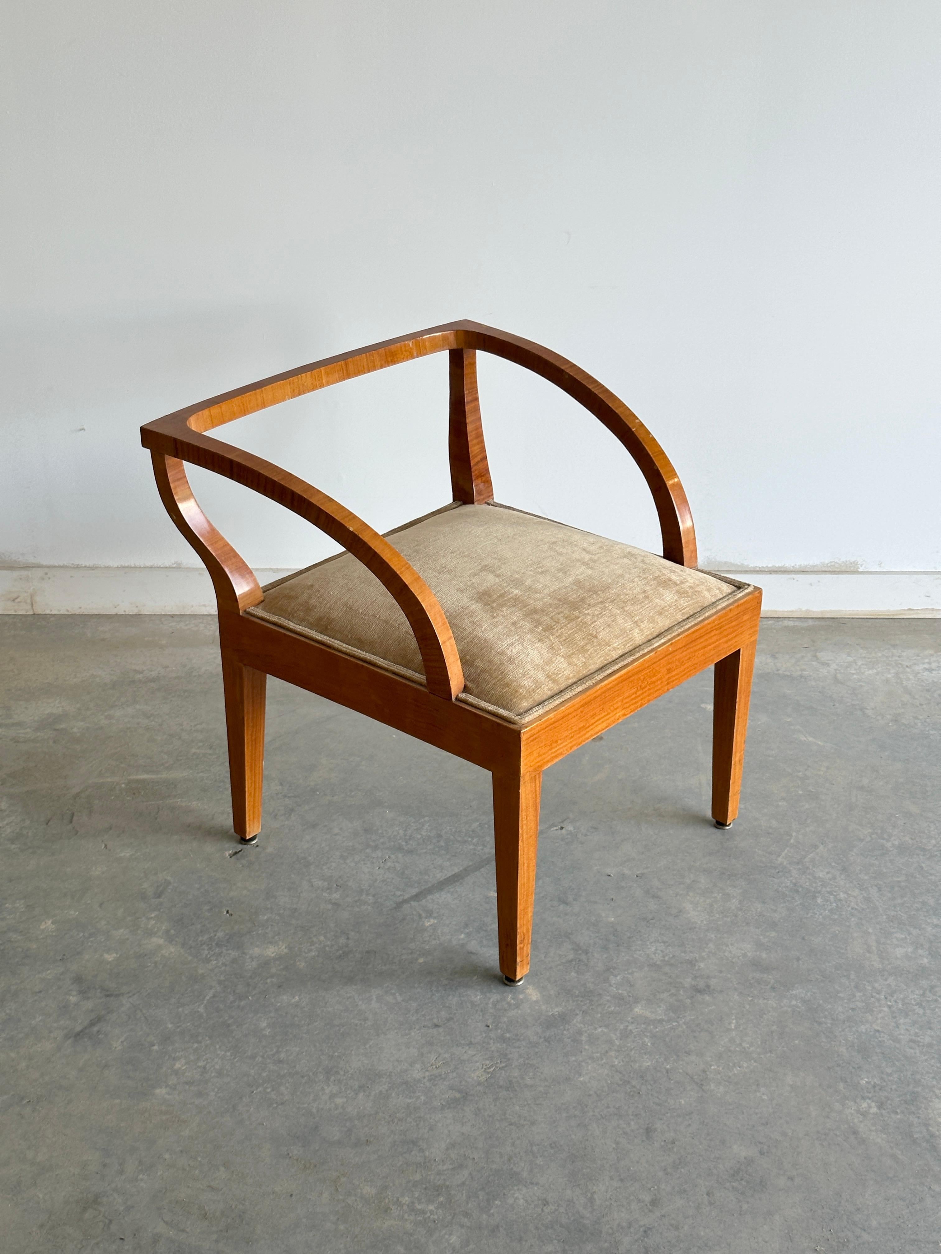 Beautiful, unique Art Deco wood veneer and golden tan chenille upholstered armchair.