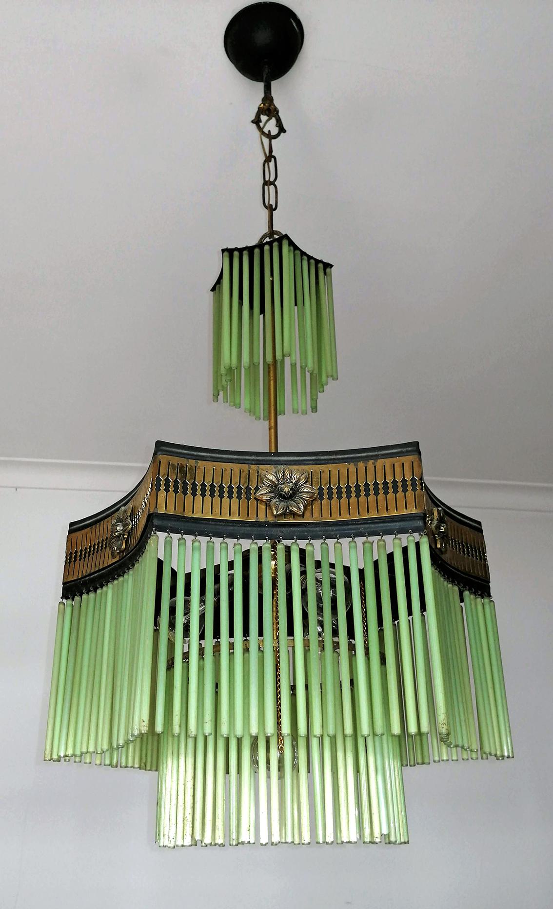 Fabulous French Art Deco & Art Nouveau gilt chandelier with amber glass beads and green glass straws
Measures: Diameter 16 in/ 40 cm
Height: 38 in (25,6 in + 12 in chain)/ 95 cm (65 cm + 30 cm chain)
Weight: 5 lb/ 4 Kg
Four light bulbs E14/ Good