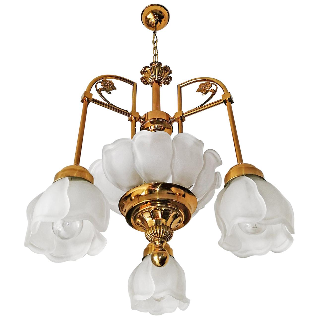 French Art Deco, Art Nouveau style art glass gilt brass chandelier, Tulip shades made of glass petals.
Measures:
Diameter; 17.7 in / 45 cm
Height 31.5 in (9.9 in/chain)/ 80 cm (25 cm/chain)
Weight 13 lb. (6 kg)
Six-light bulbs E14 / good working