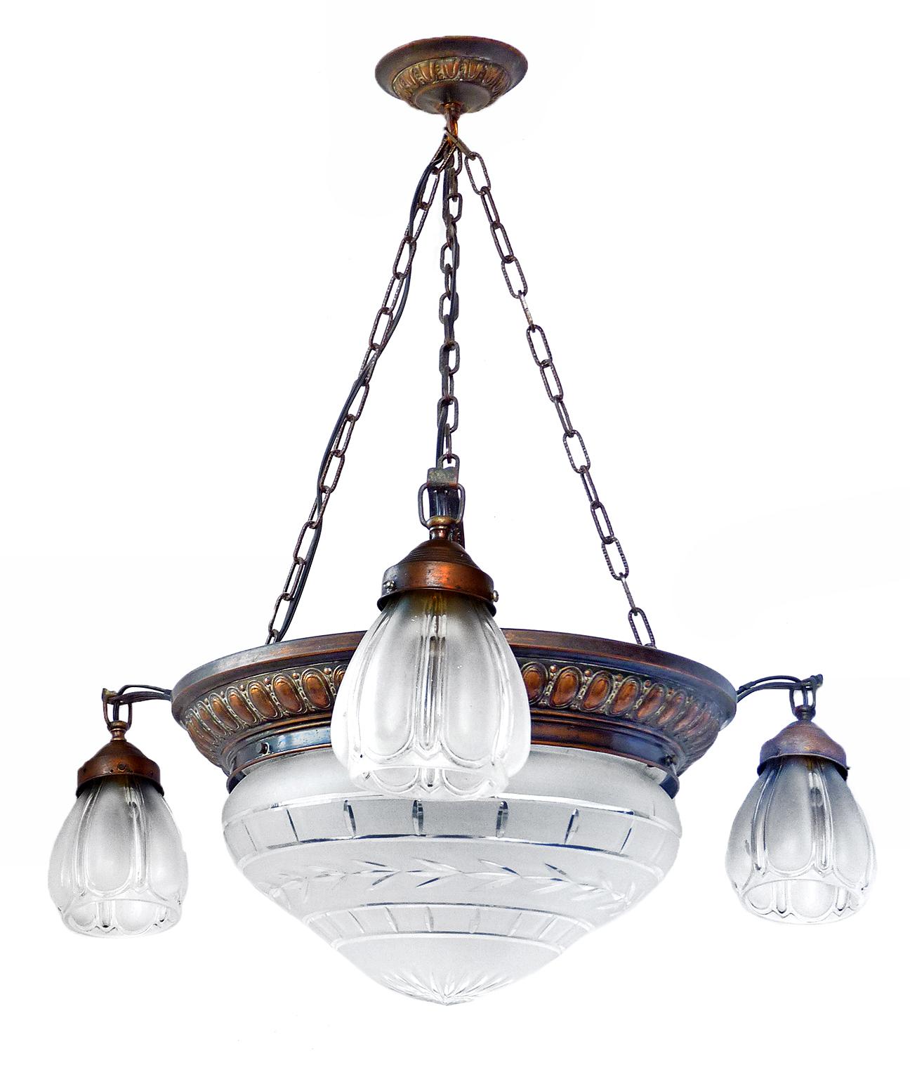 An unusual antique French Art Deco wheel cut crystal glass globes 4-light chandelier,
circa 1920s.
Four bulbs E27/ good working condition.
Measures: Glass bowl 20 x 22 cm.
Glass globes 13 x 15 cm.
Assembly required. Bulbs not included.
