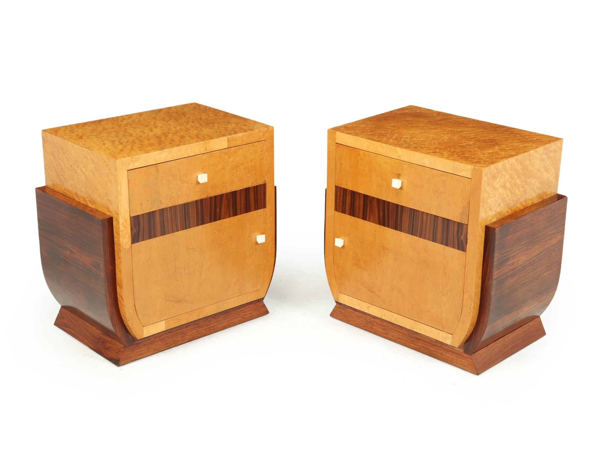 A pair of French Art Deco bedside cabinets produced in the 1930s from oak and veneered in birds-eye maple and rosewood, they are in lovely condition throughout and have been fully polished

Age: 1930

Style: Art Deco

Material: Birds-eye maple
