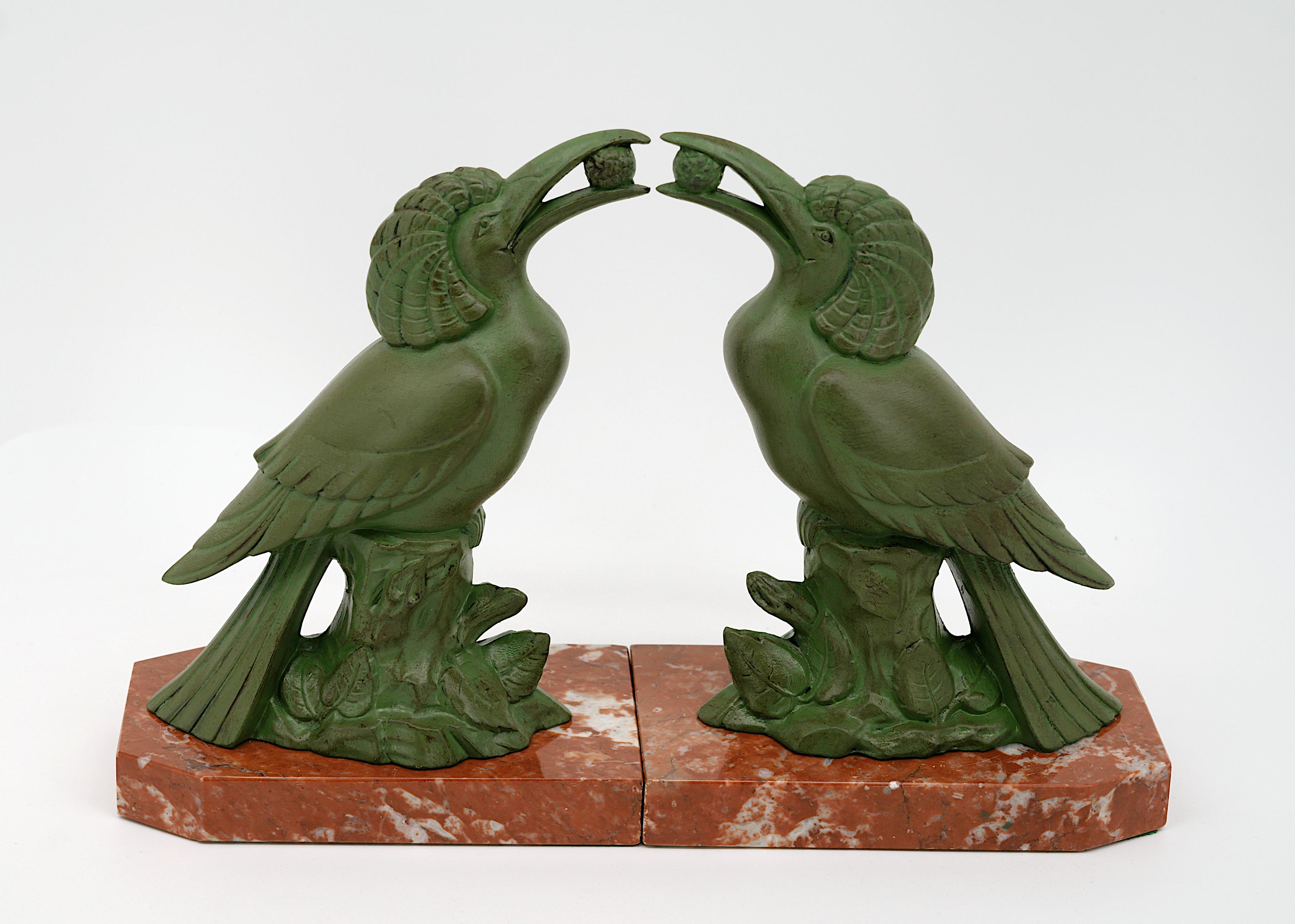 French Art Deco bookends, France, 1930's. Fantastical birds. Spelter & marble. Height 7.5