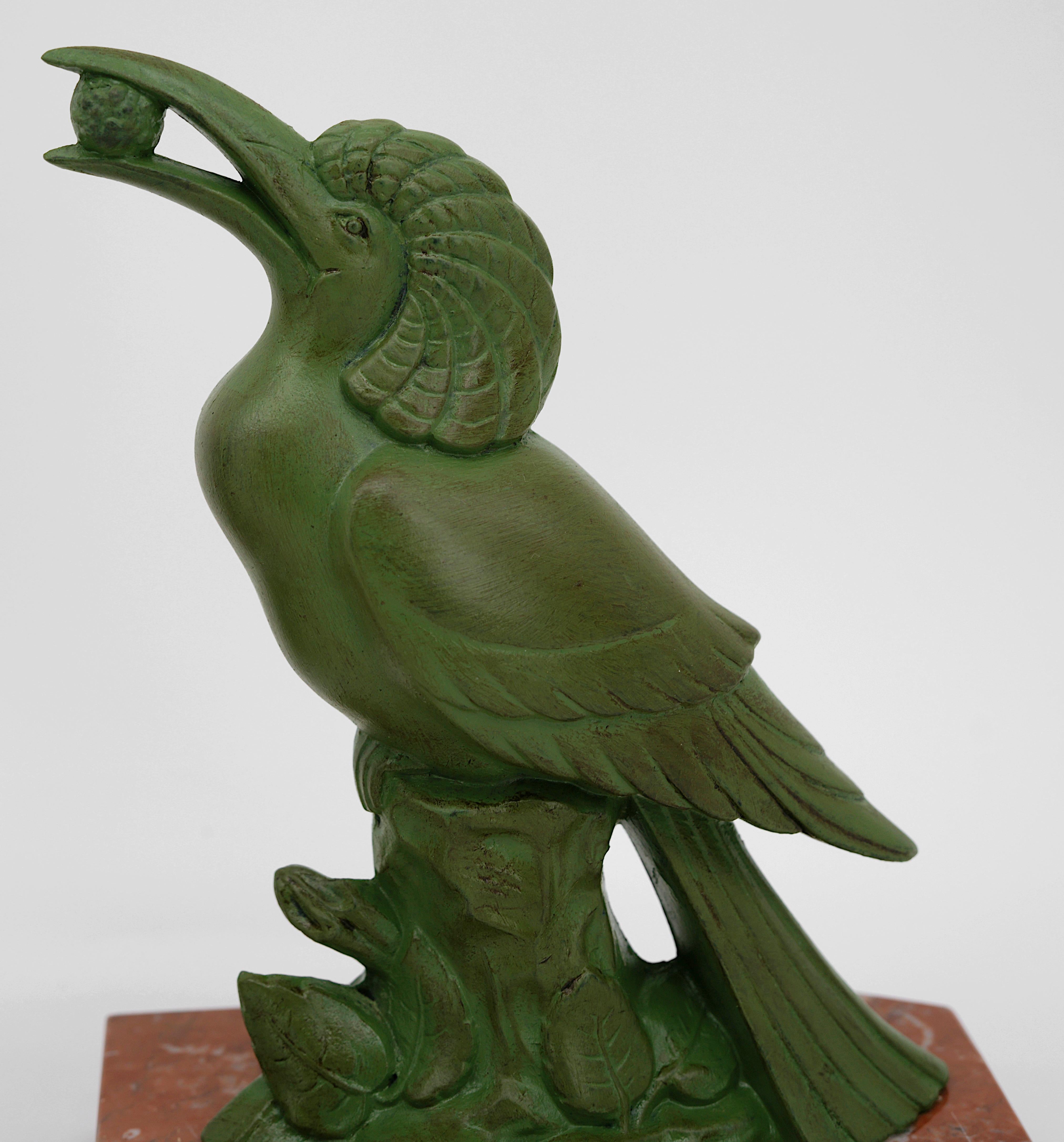 French Art Deco bookends, France, 1920s. Fantastical birds. Spelter & marble. Height 7.5