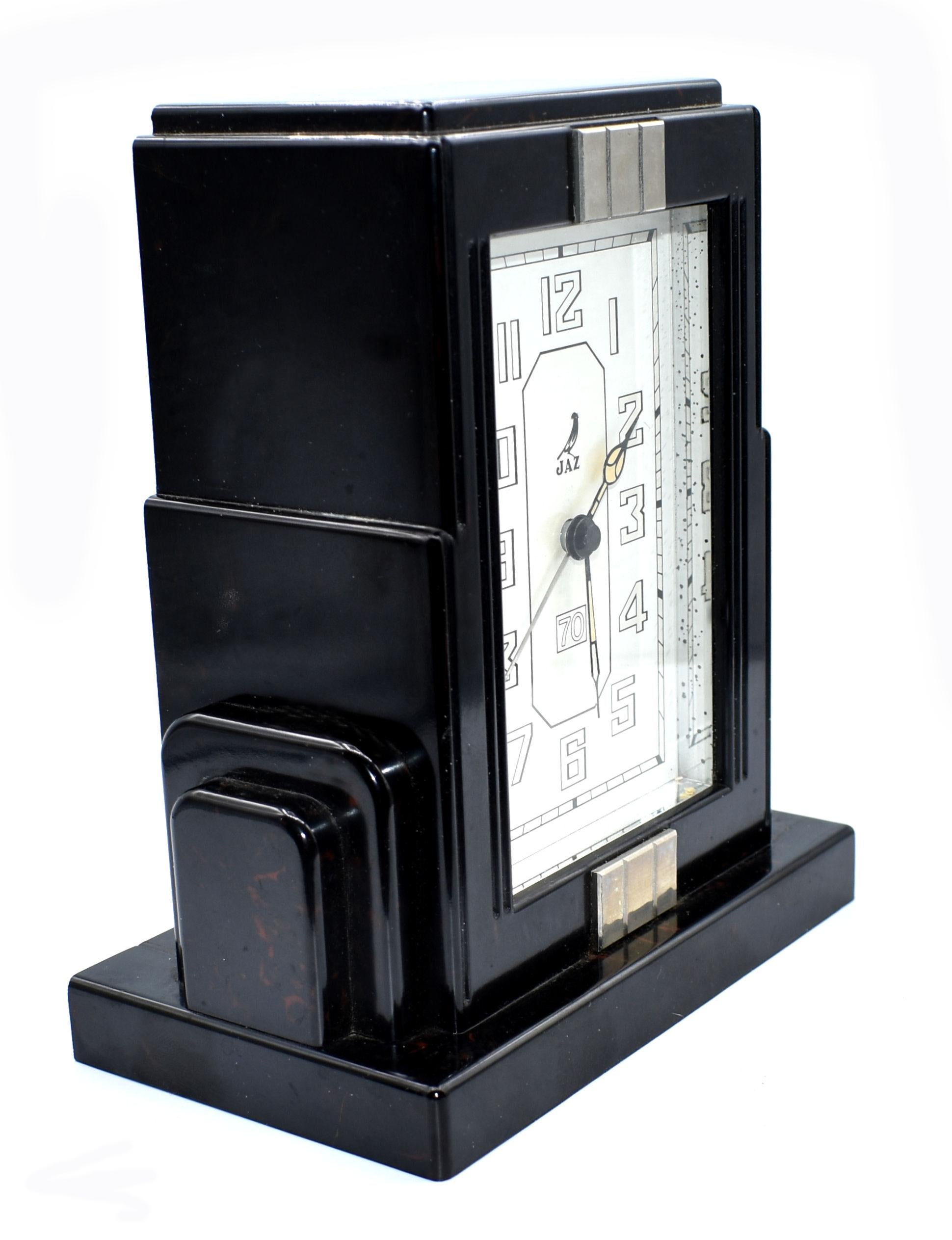 Fabulous Art Deco clock by JAZ a French clock maker. This clock is black bakelite and a not unusual colorway not often found with a wonderful skyscraper shaped casing. The condition of the face is particularly good showing little to no signs of it's