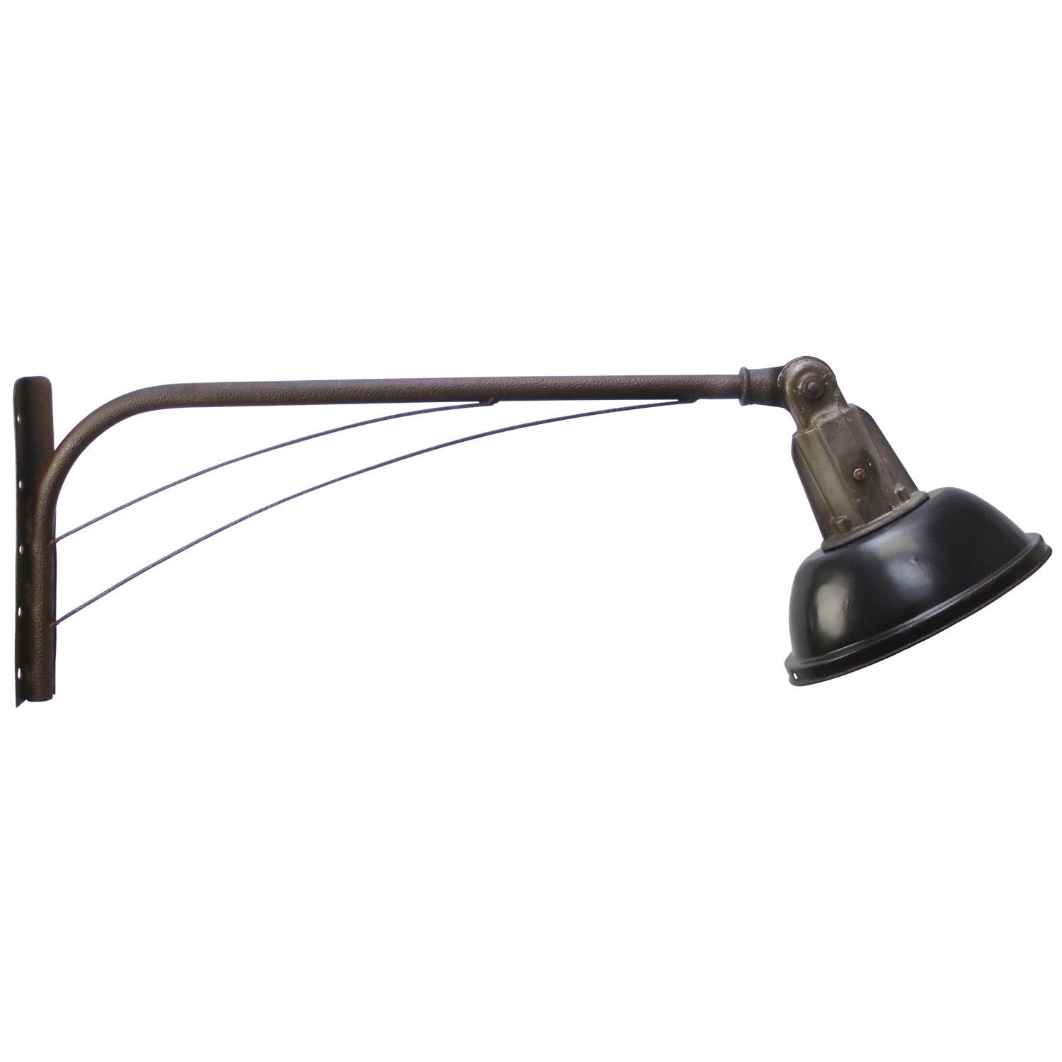 French iron street light by EDR, France
Black enamel shade with aluminium top and iron arm.

Size enamel shade 32 × 24 cm

Size wall plate 36 × 6 cm

Shipped in parts, easy to assemble

Weight: 5.00 kg / 11 lb

Priced per individual item. All lamps
