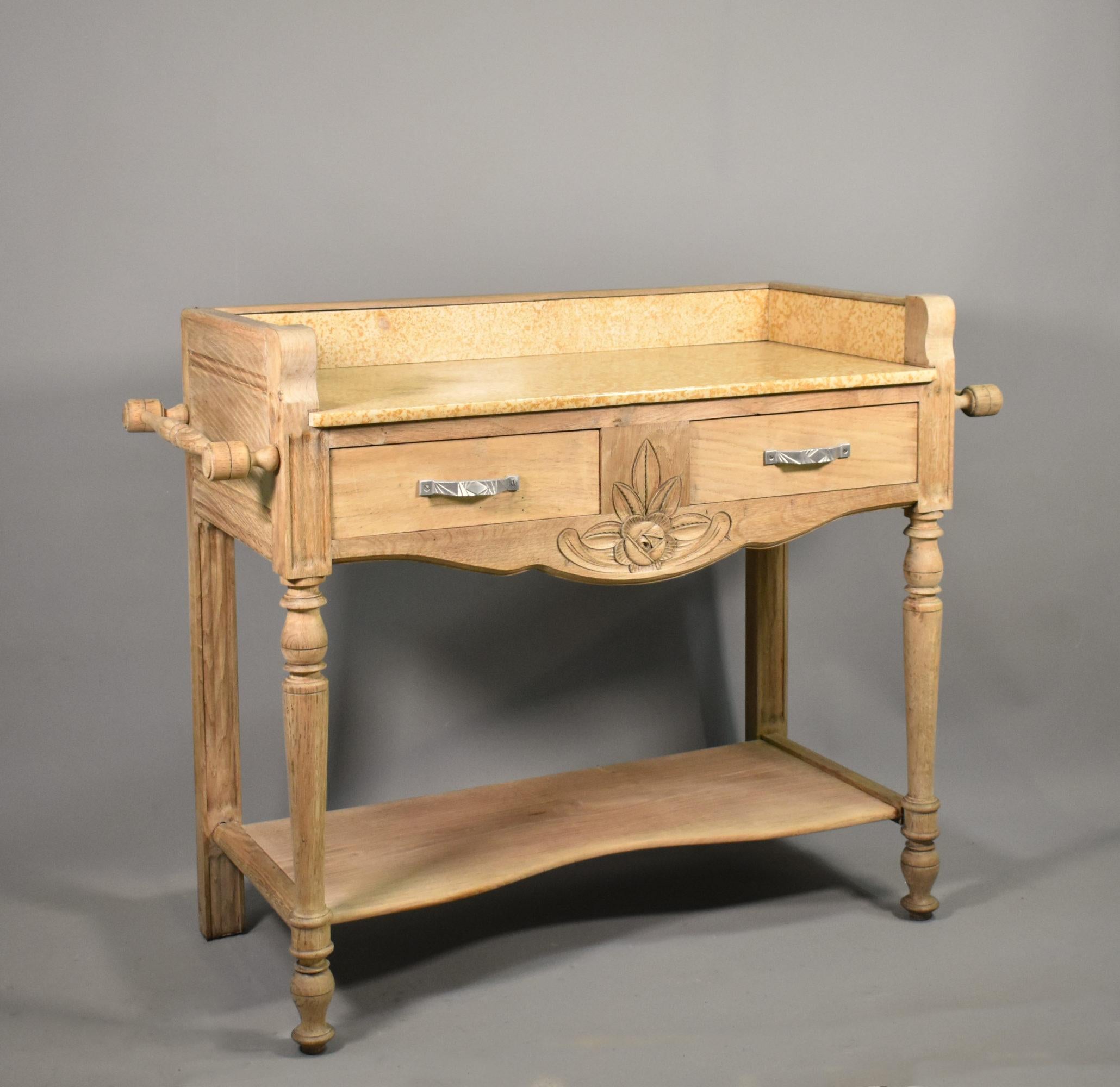 French Art Deco Bleached Oak Washstand
 
An attractive and good-sized washstand originating from the Basque region of South West France.
 
In solid bleached oak the washstand features an inset variegated marble top and surround. It is unusual to