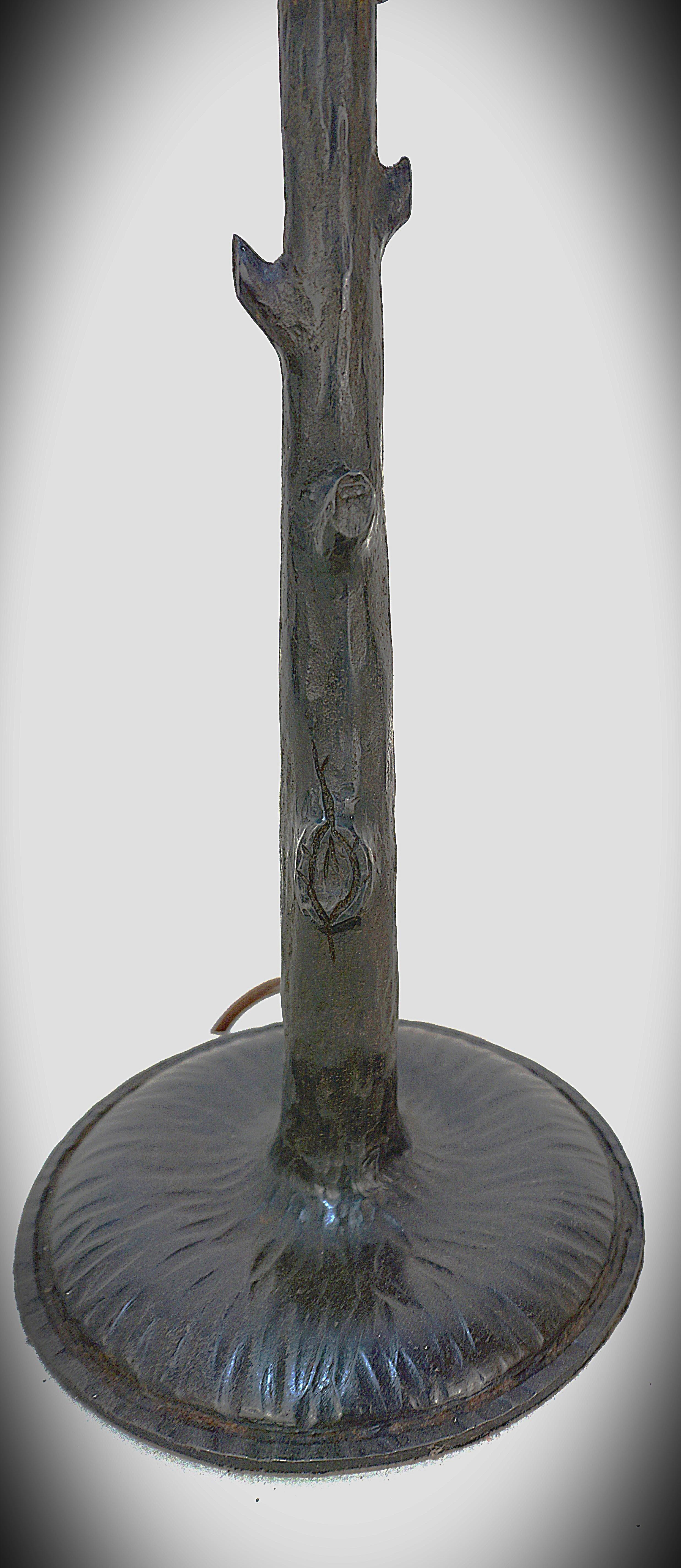 1920's sculpture table lamp, wrought iron base in shape of tree trunk and hand-blown glass shade by Charles Schneider.   